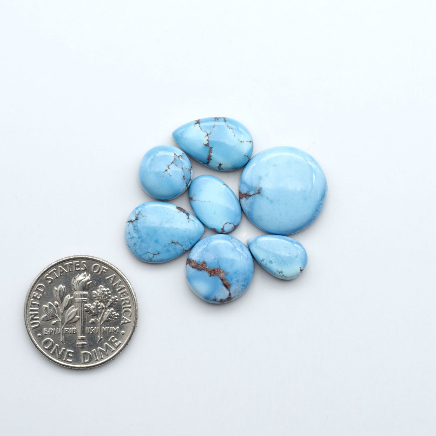 Discover the beauty of Natural Golden Hills Turquoise—prized for its icy blue tones, golden matrix, and exceptional quality. Ideal for artisan jewelry designs.