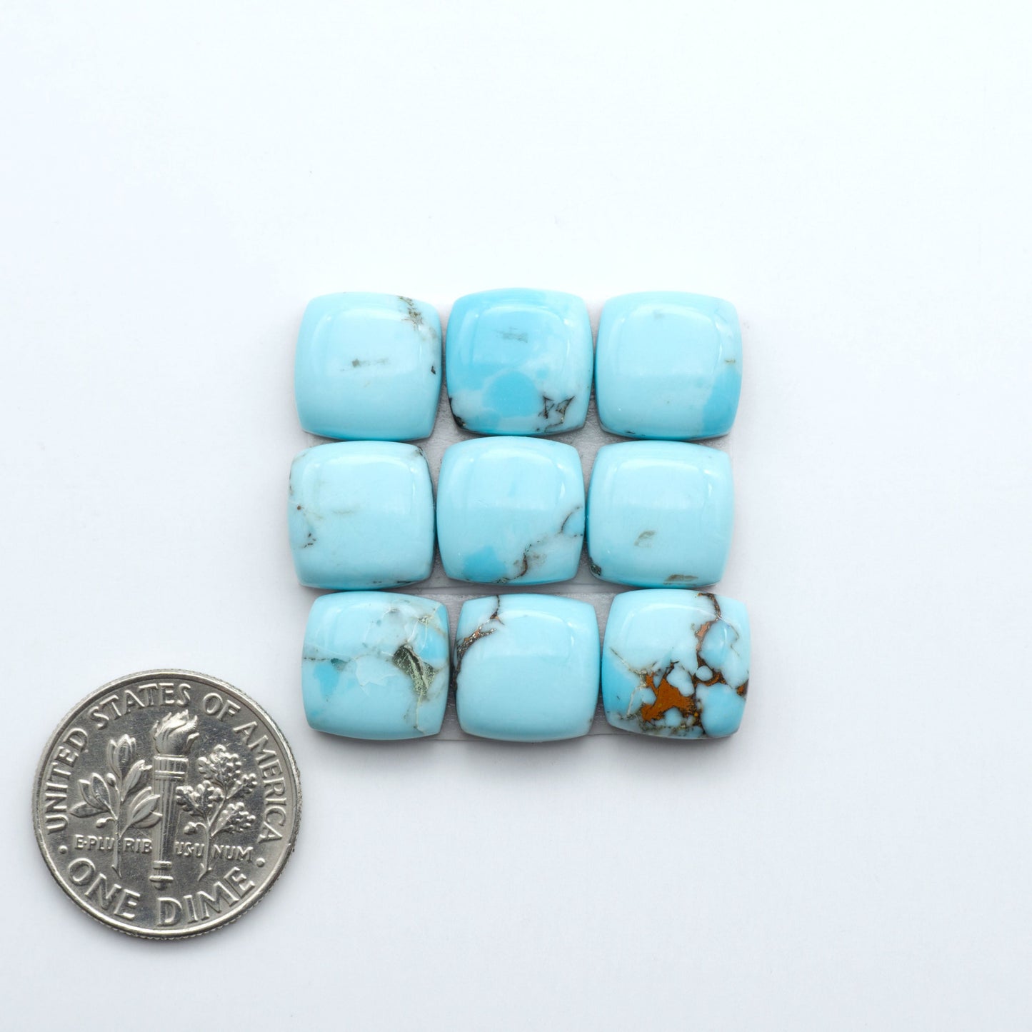 Enhance your jewelry designs with Pressed Turquoise Nugget Cabochons. Crafted from composite materials they add a captivating touch to your creations.