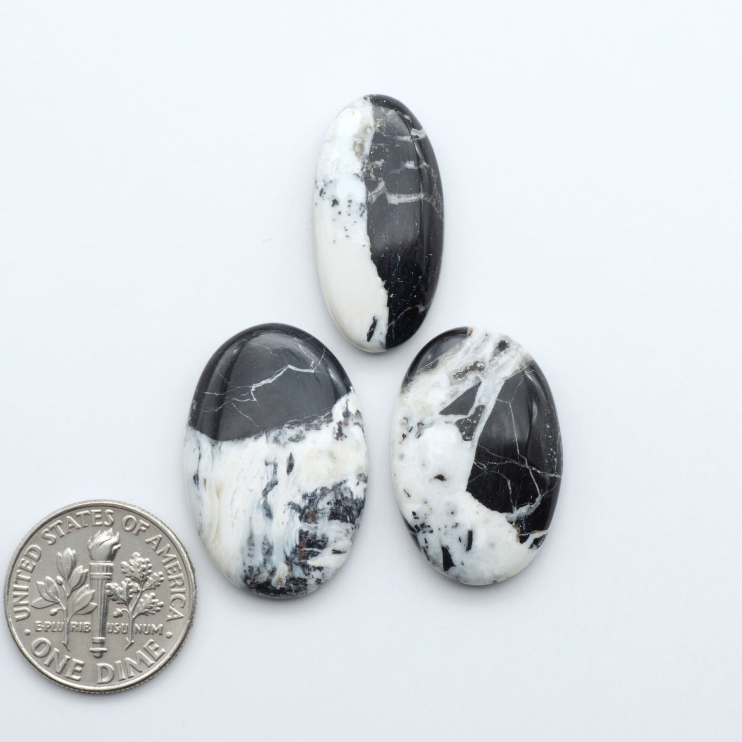 Natural White Buffalo Stone Cabochons are semi-precious gemstones cut into shapes ideal for jewelry-making, making them an excellent choice for artisans.