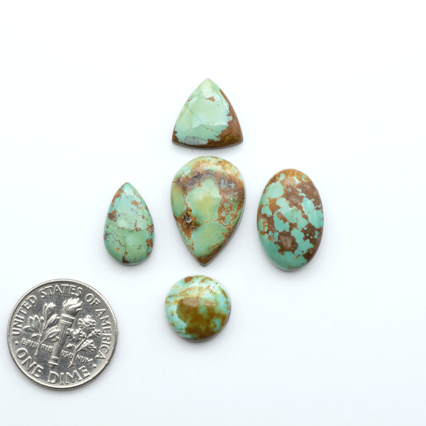 Add a touch of beauty to your collection with our stunning Pilot Mountain Turquoise Cabochons. Perfect for jewelry making each piece is truly one-of-a-kind.