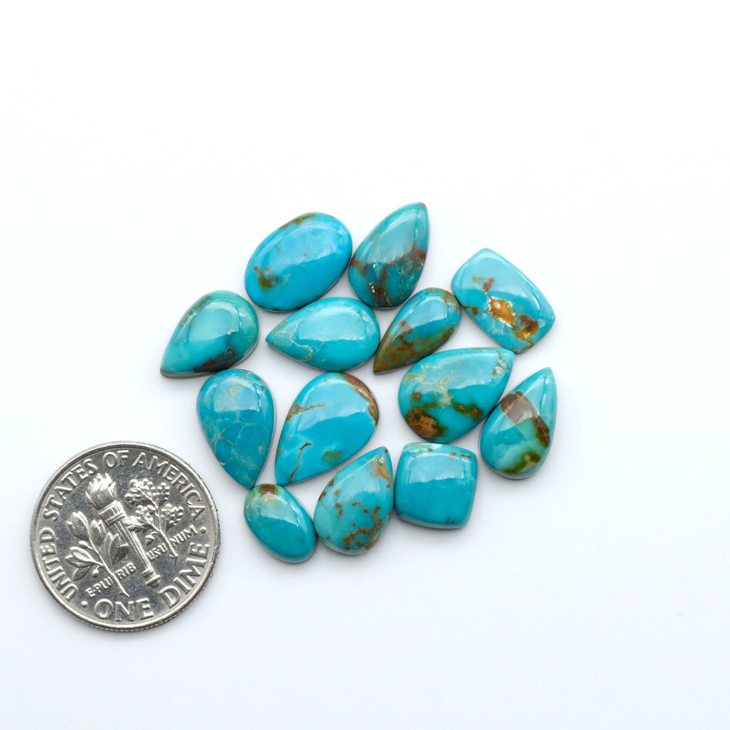 Add a touch of beauty to your collection with our stunning Pilot Mountain Turquoise Cabochons. Perfect for jewelry making each piece is truly one-of-a-kind.
