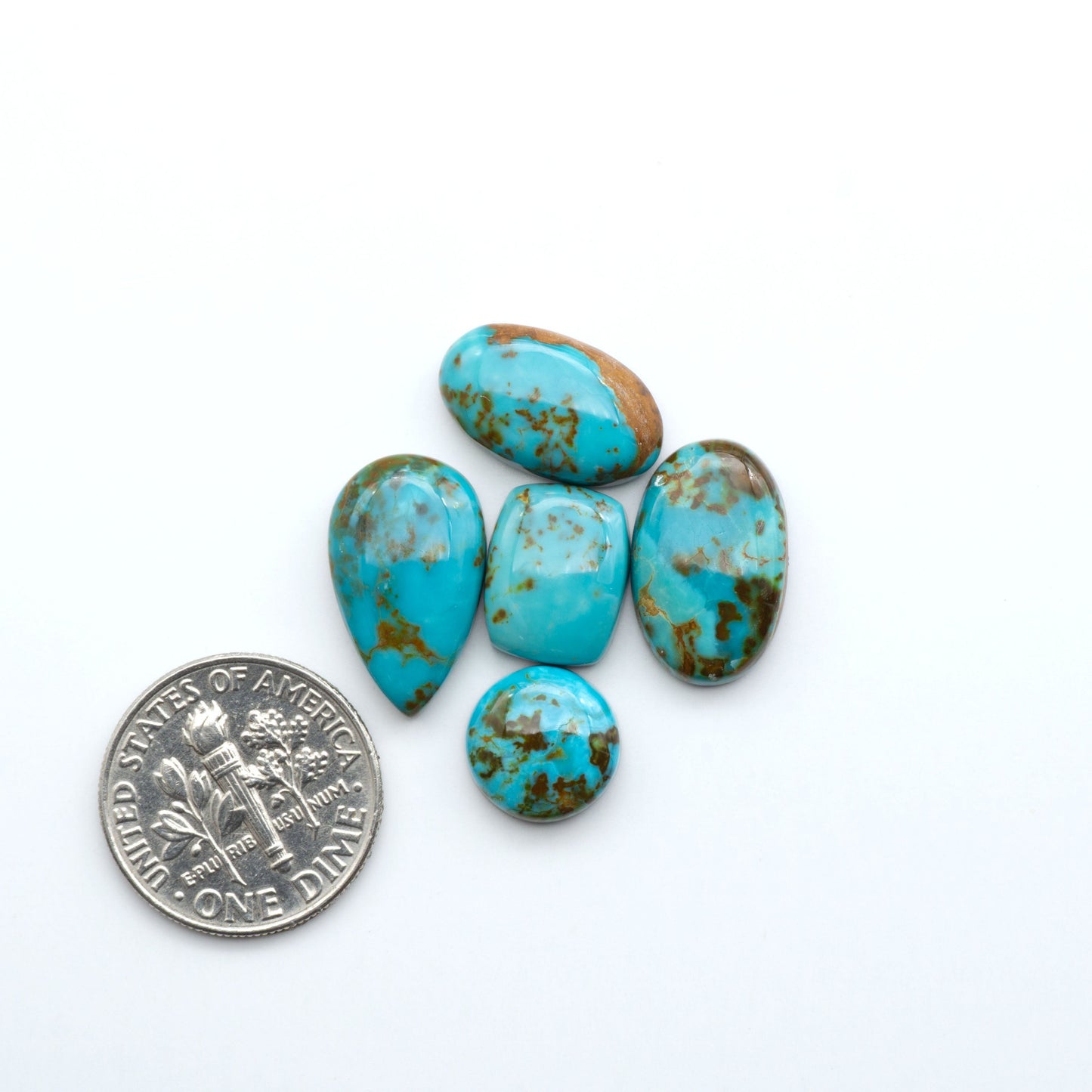 Add a touch of beauty to your collection with our stunning Pilot Mountain Turquoise Cabochons. Perfect for jewelry making each piece is truly one-of-a-kind.