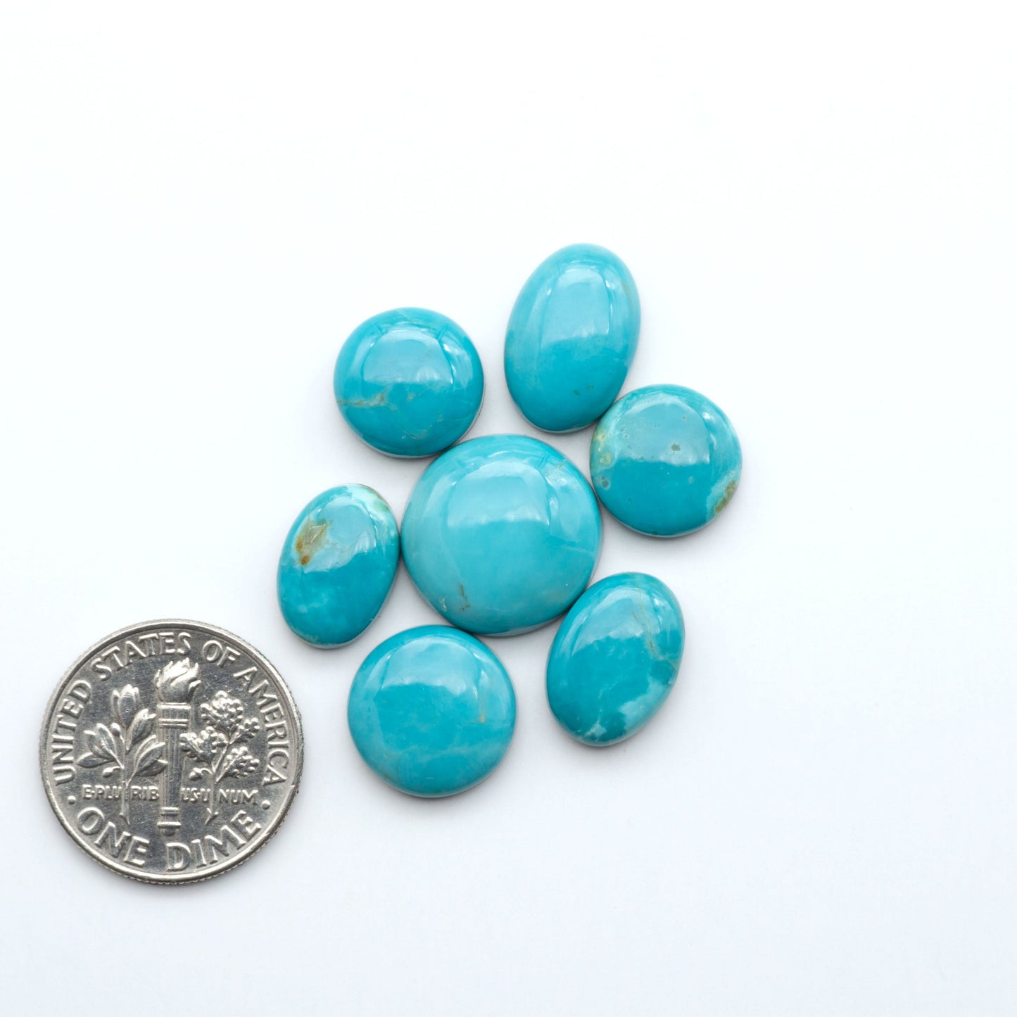 Add a touch of beauty to your collection with our stunning Pilot Mountain Turquoise Cabochons. Perfect for jewelry making each piece is truly one-of-a-kind.