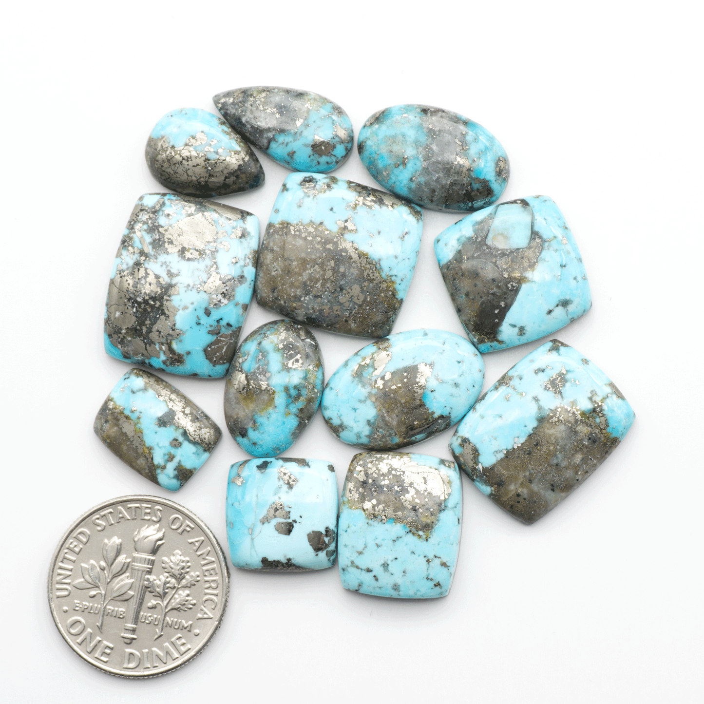 Nacozari turquoise cabochons are striking gemstones known for their vibrant blue to greenish-blue colors and pyrite, these stones are prized in jewelry making.