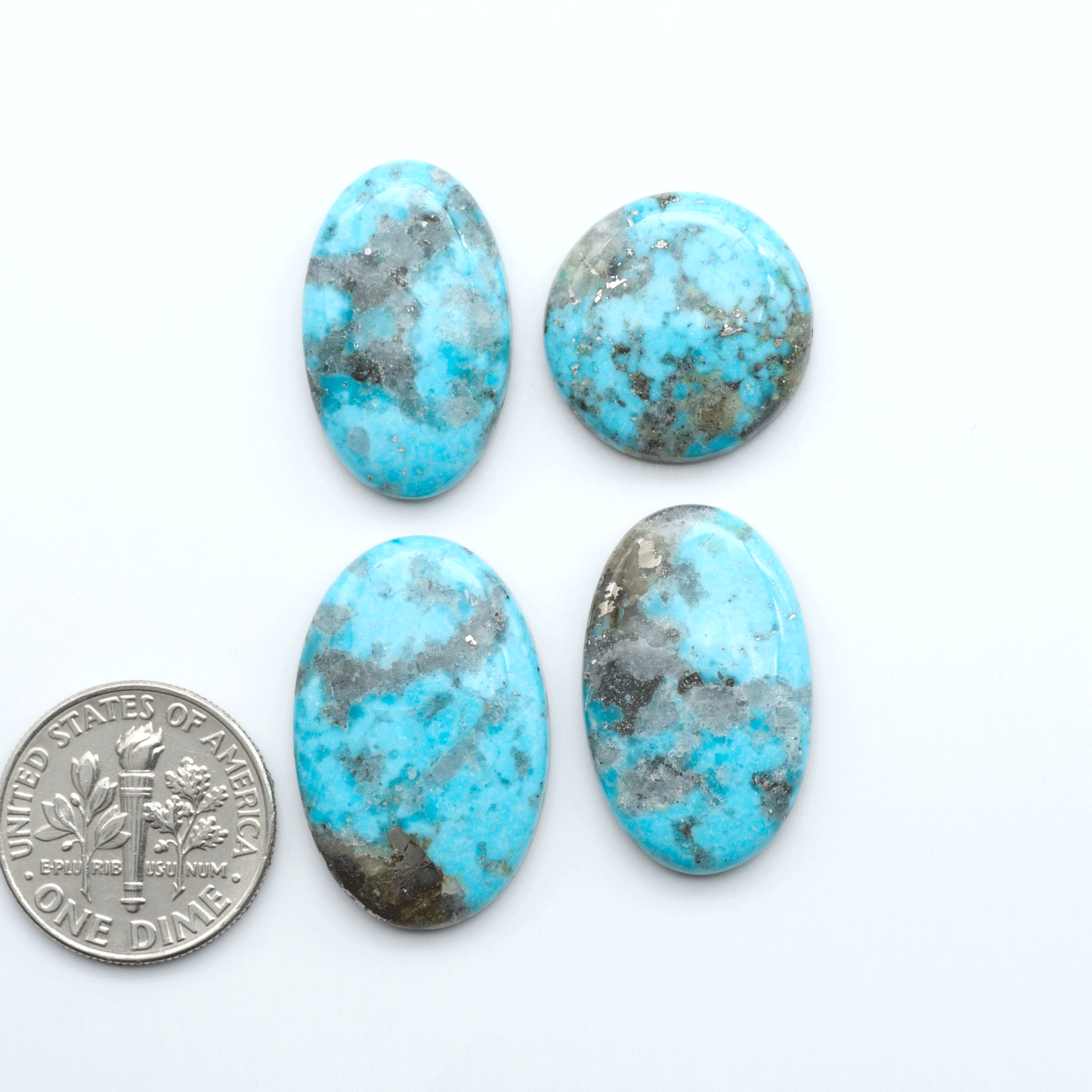 Nacozari turquoise cabochons are striking gemstones known for their vibrant blue to greenish-blue colors and pyrite, these stones are prized in jewelry making.