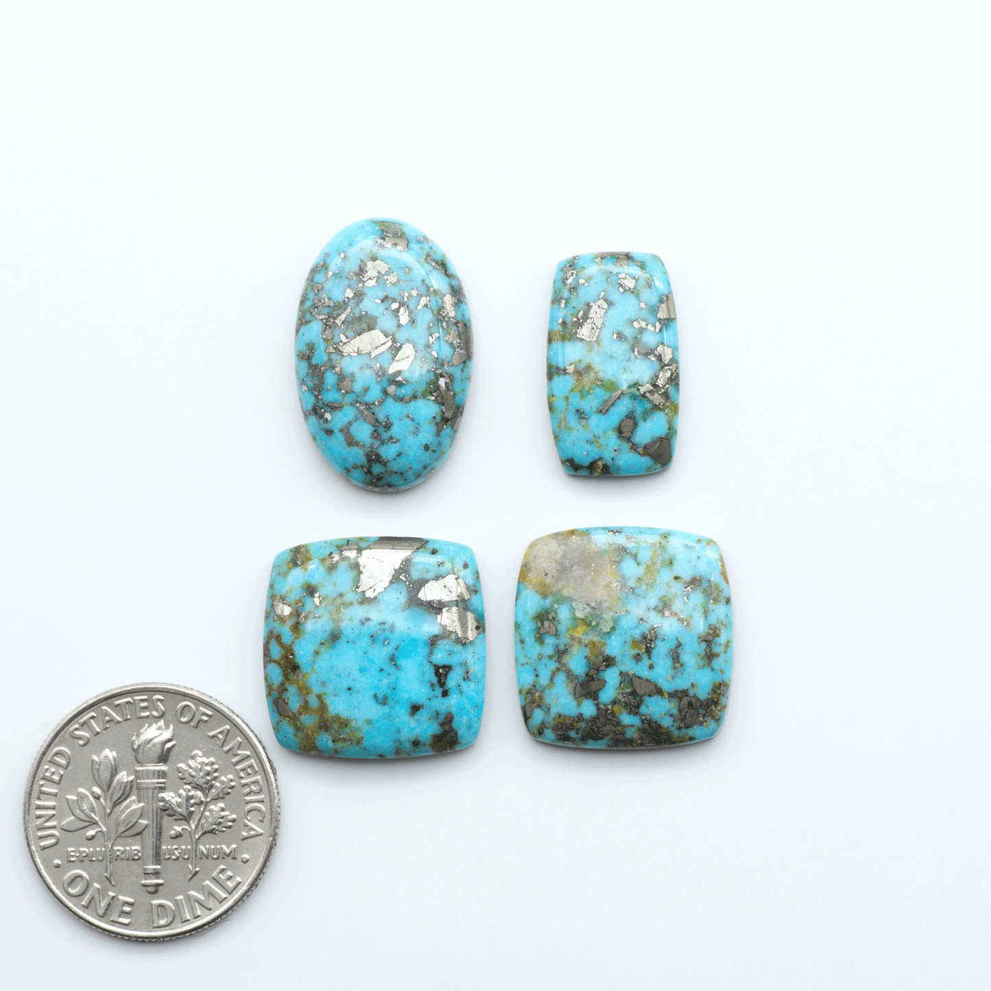 Nacozari turquoise cabochons are striking gemstones known for their vibrant blue to greenish-blue colors and pyrite, these stones are prized in jewelry making.