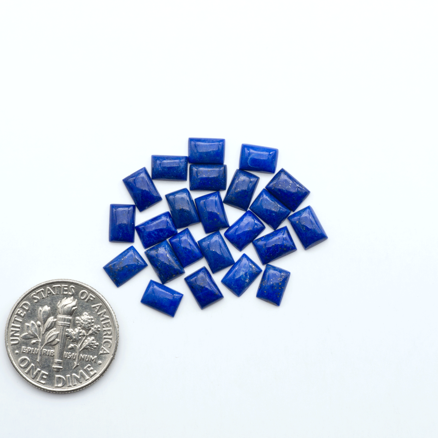 Shop natural Lapis Lazuli cabochons with rich blue tones and golden pyrite, perfect for silversmiths and jewelry makers designing custom pieces.