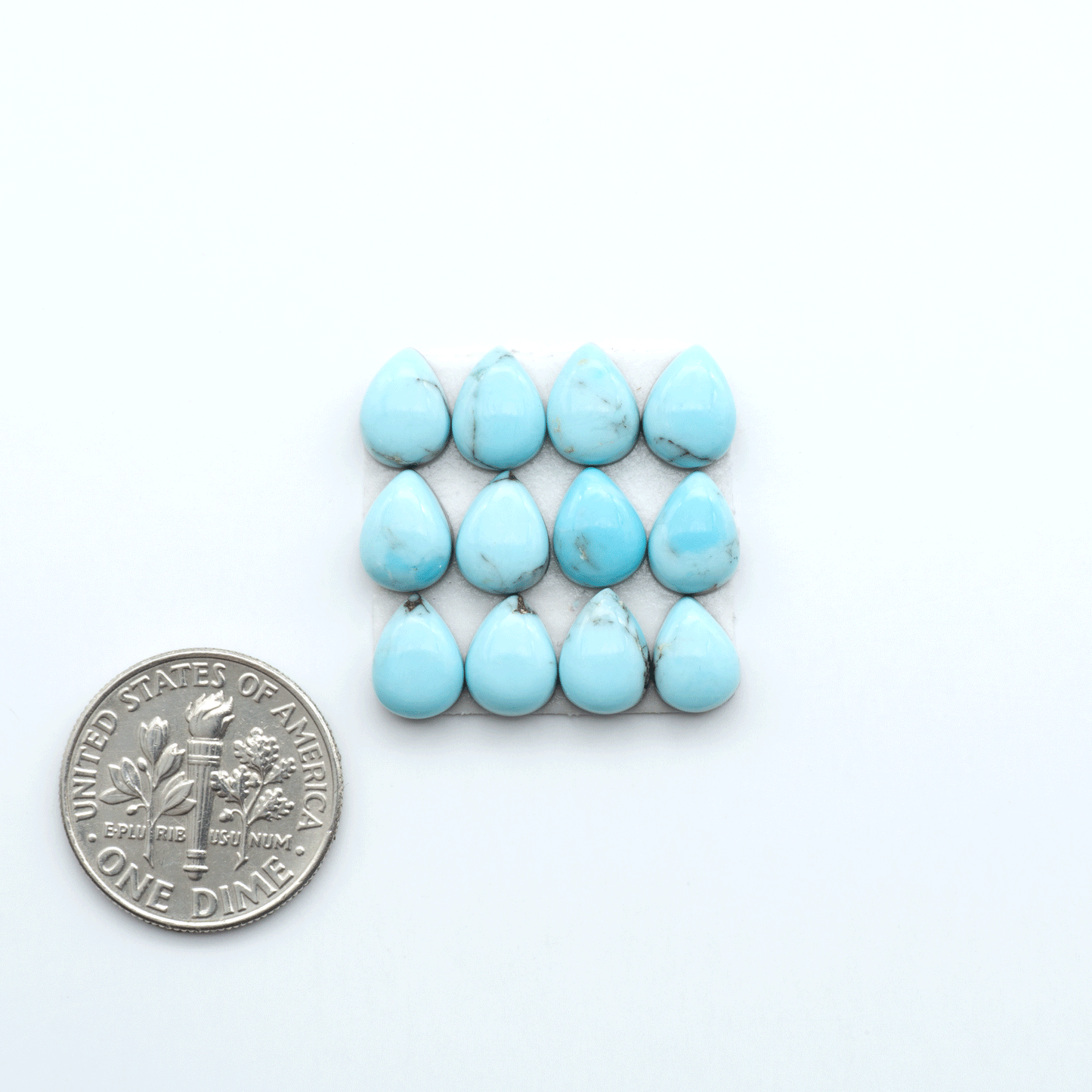 Enhance your jewelry designs with Pressed Turquoise Nugget Cabochons. Crafted from composite materials they add a captivating touch to your creations.