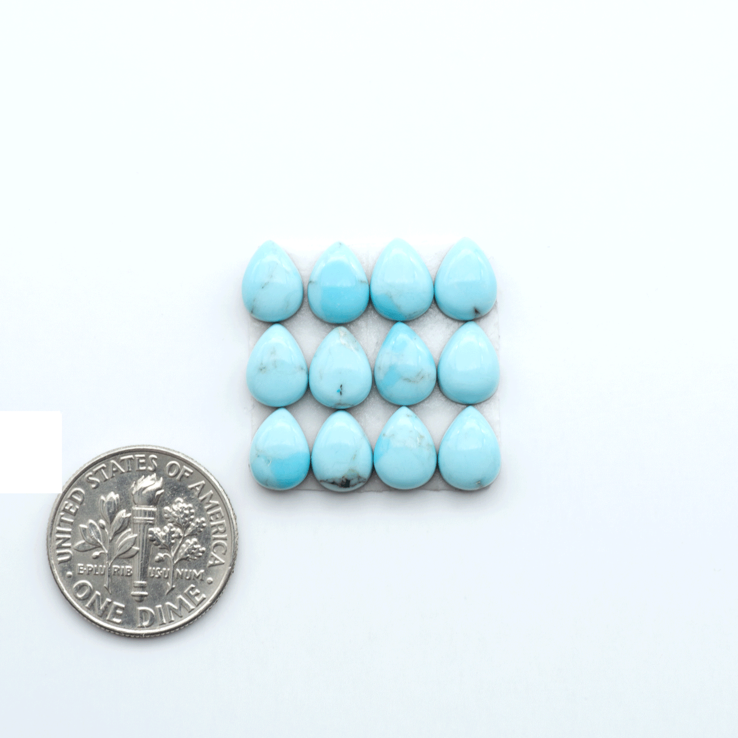 Enhance your jewelry designs with Pressed Turquoise Nugget Cabochons. Crafted from composite materials they add a captivating touch to your creations.