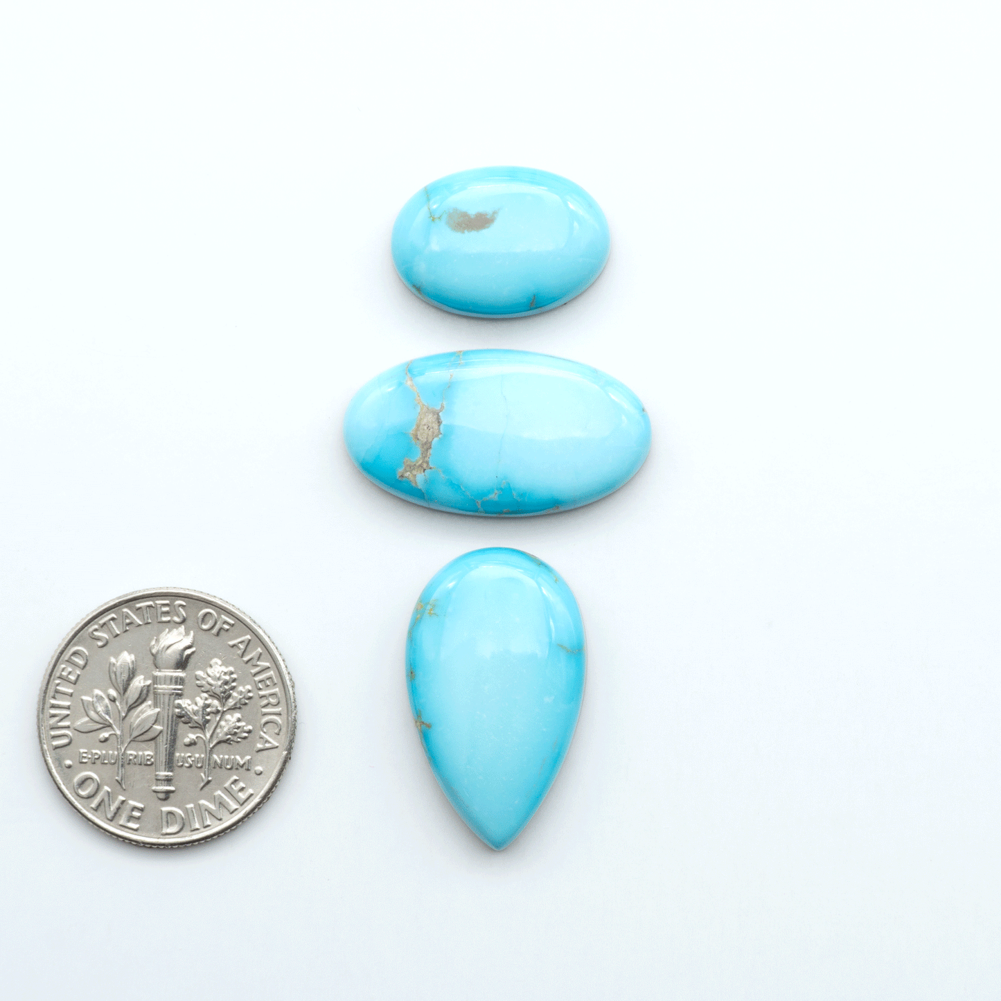 Sierra Bella Turquoise cabochons feature rich blue-green color and natural matrix variation. Ideal for silversmiths, jewelers, and custom jewelry designs.