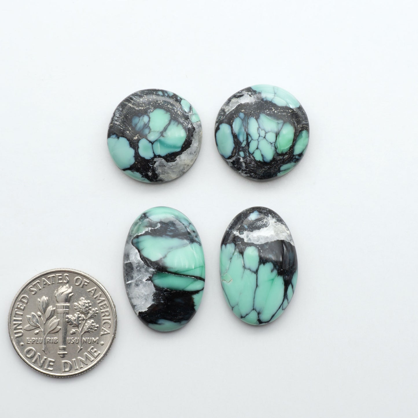 Shop Variscite cabochons with natural matrix patterns, ideal for silversmiths and jewelry makers creating custom rings and pendants.
