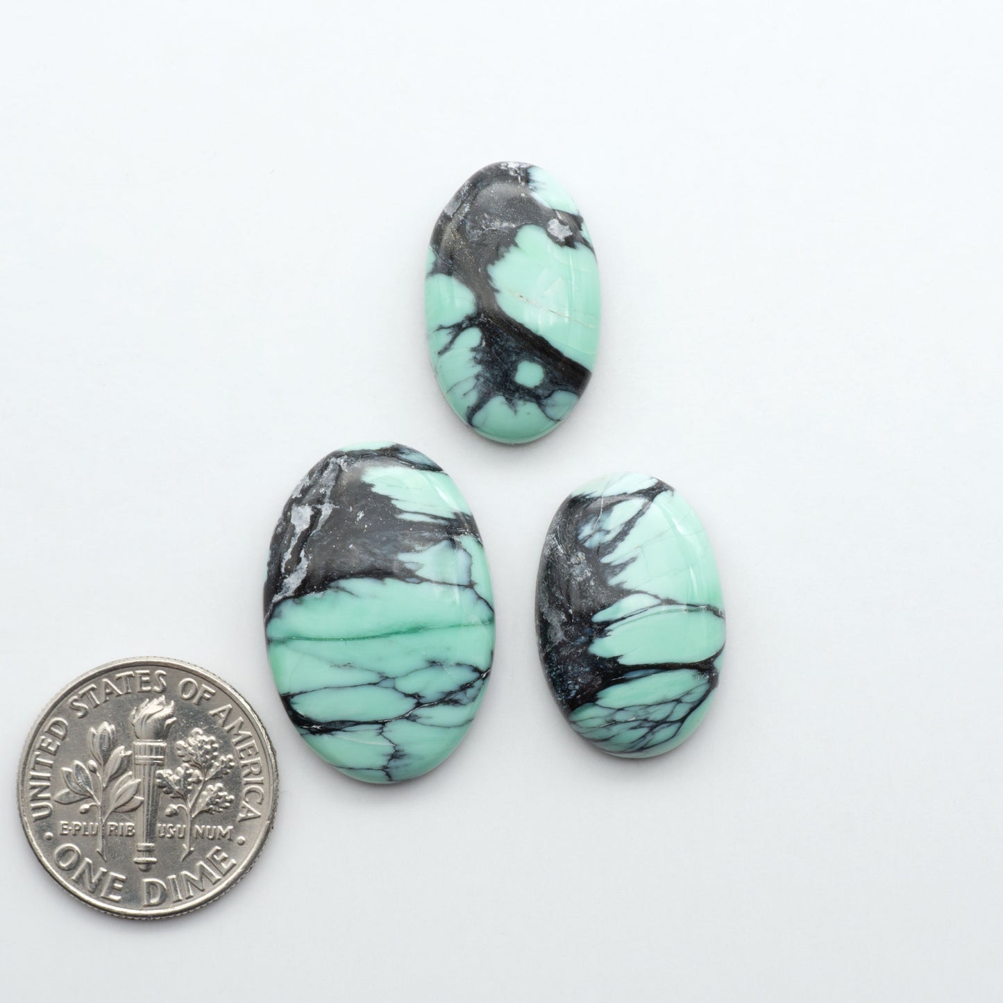 Shop Variscite cabochons with natural matrix patterns, ideal for silversmiths and jewelry makers creating custom rings and pendants.