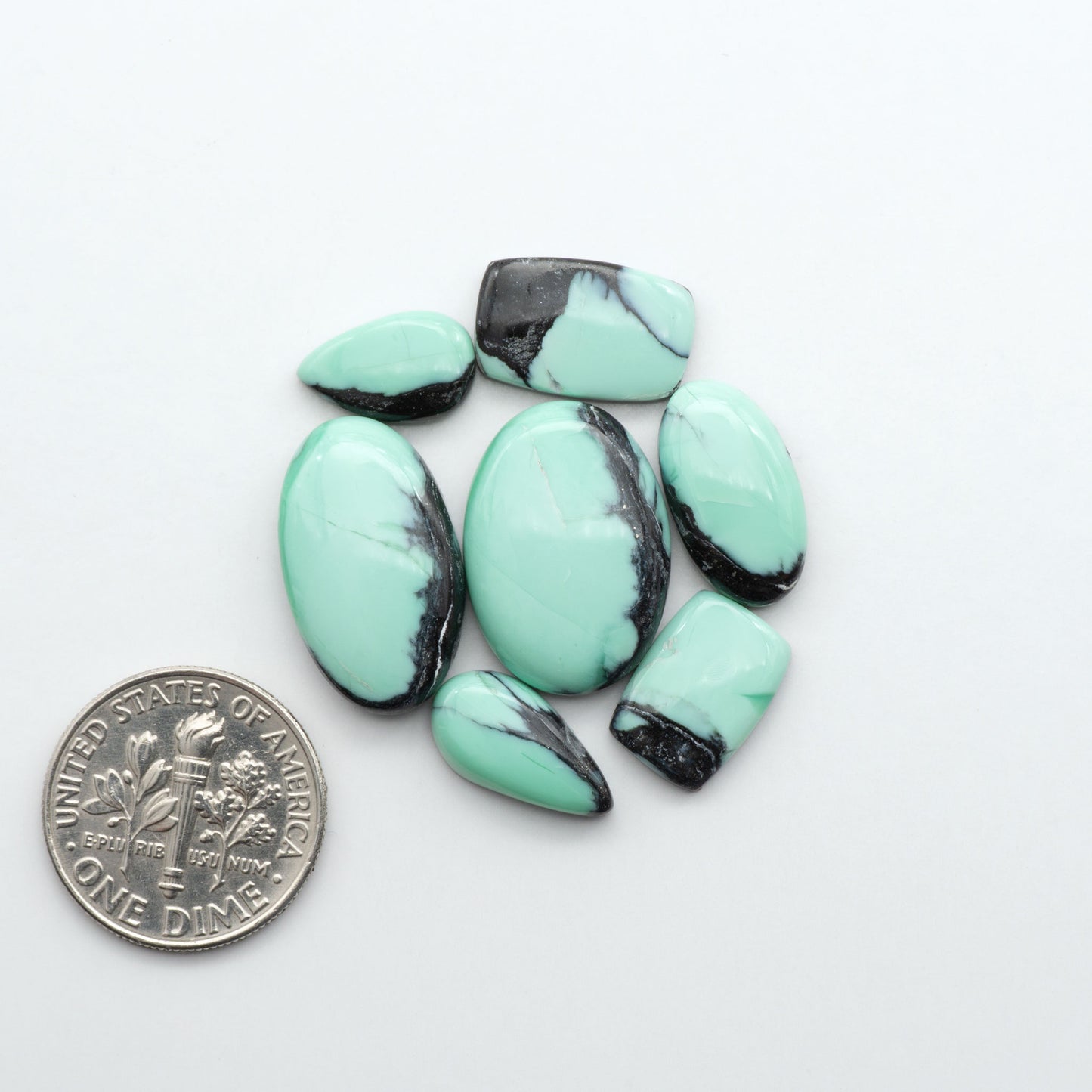 Shop Variscite cabochons with natural matrix patterns, ideal for silversmiths and jewelry makers creating custom rings and pendants.