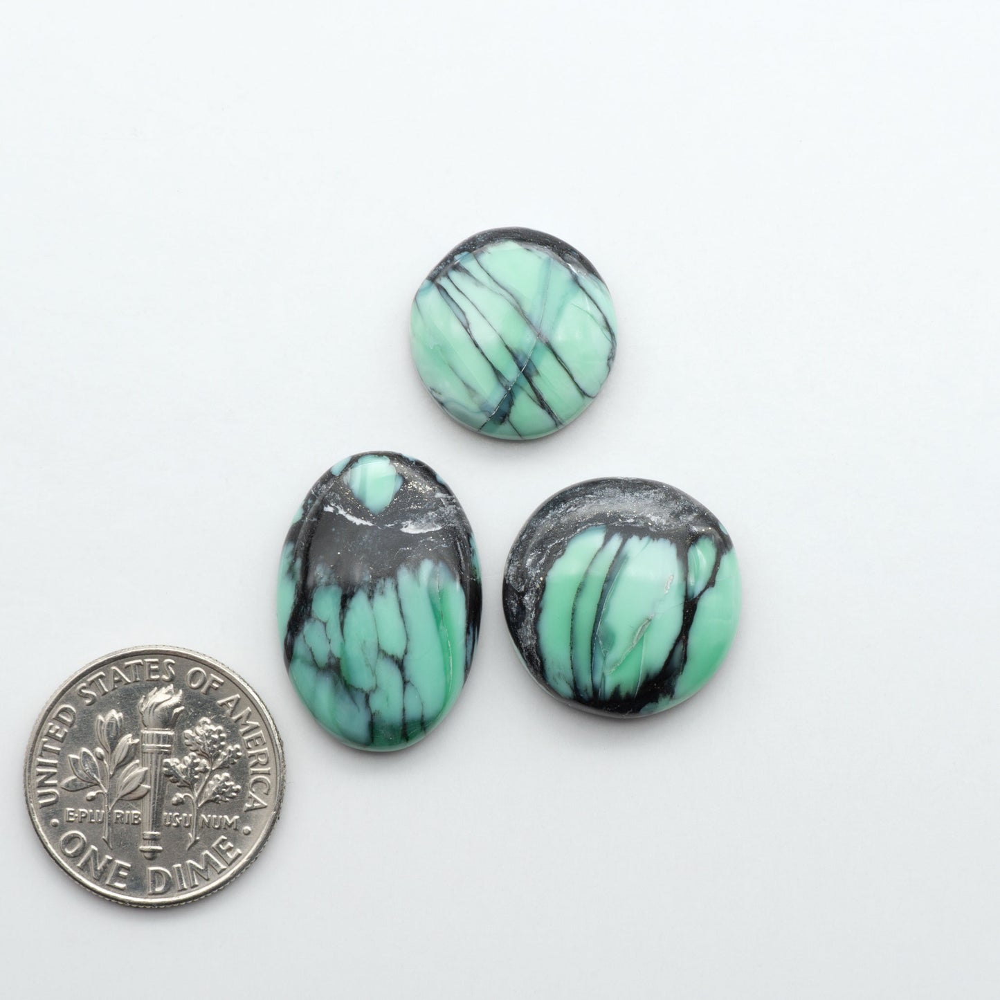 Shop Variscite cabochons with natural matrix patterns, ideal for silversmiths and jewelry makers creating custom rings and pendants.