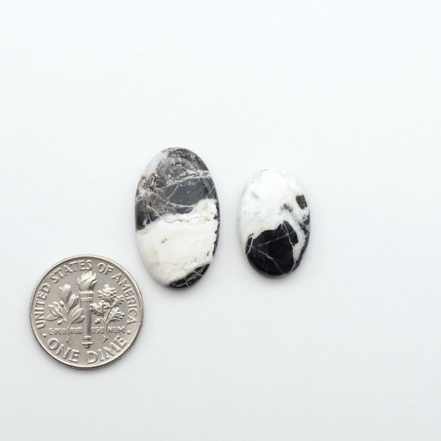 Natural White Buffalo Stone Cabochons are semi-precious gemstones cut into shapes ideal for jewelry-making, making them an excellent choice for artisans.
