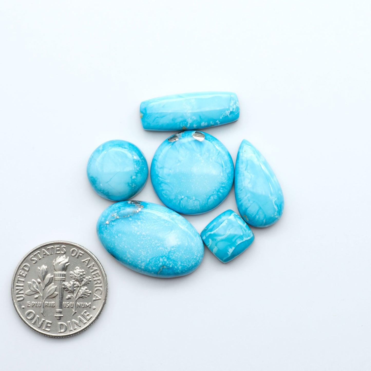 Create stunning handcrafted jewelry with Blue Bird Turquoise Cabochons. Their rich blue color and polish make them perfect for silversmiths and jewelry makers.