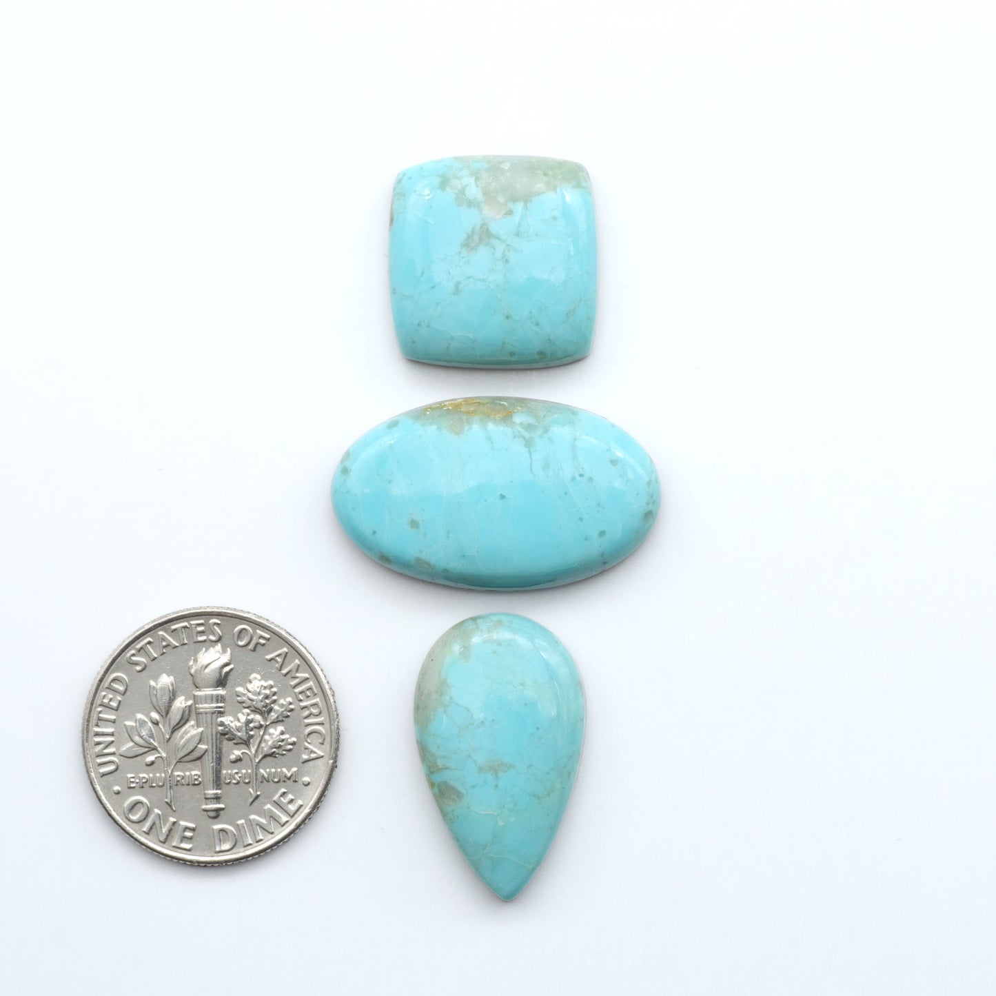 Add a touch of beauty to your collection with our stunning Pilot Mountain Turquoise Cabochons. Perfect for jewelry making each piece is truly one-of-a-kind