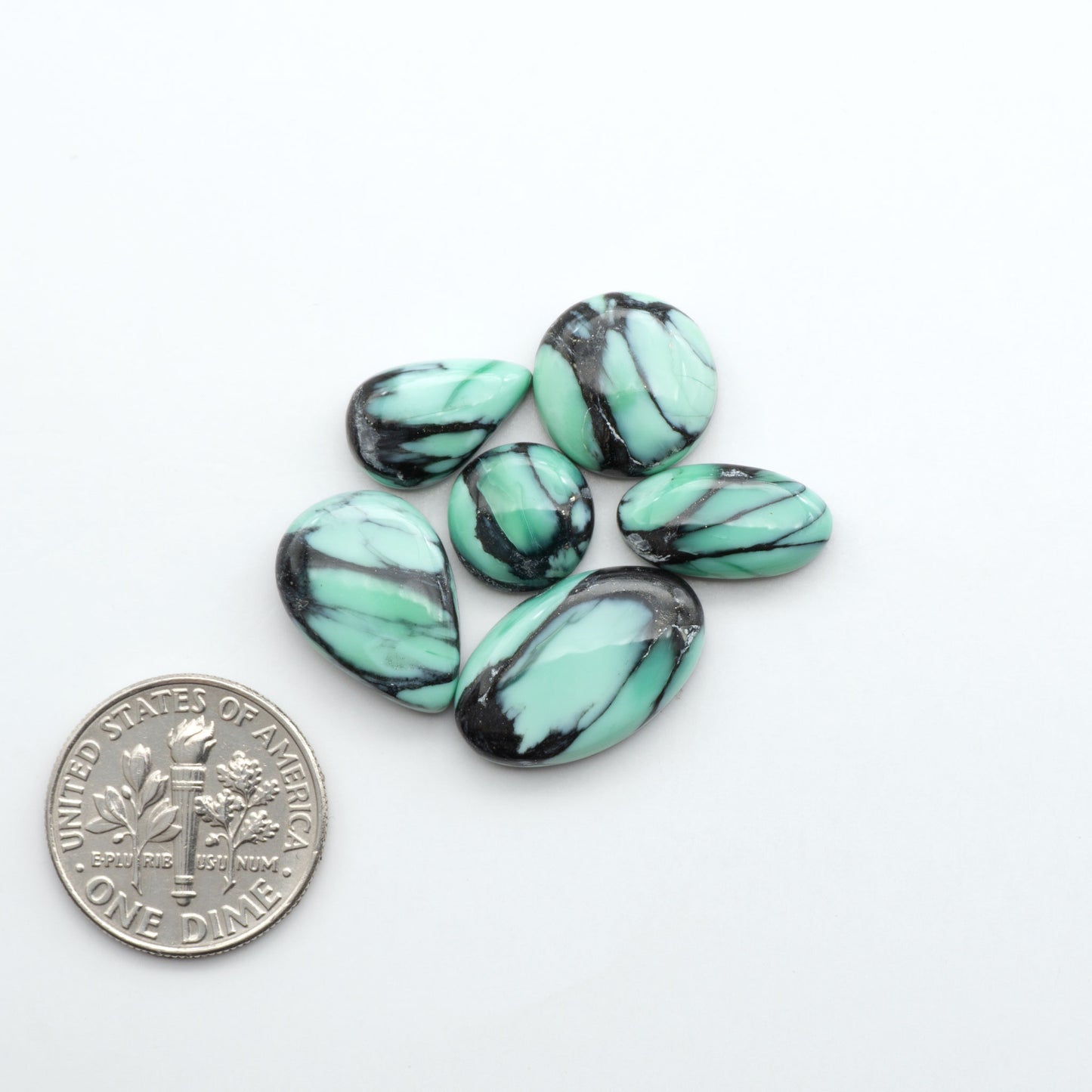 Shop Variscite cabochons with natural matrix patterns, ideal for silversmiths and jewelry makers creating custom rings and pendants.