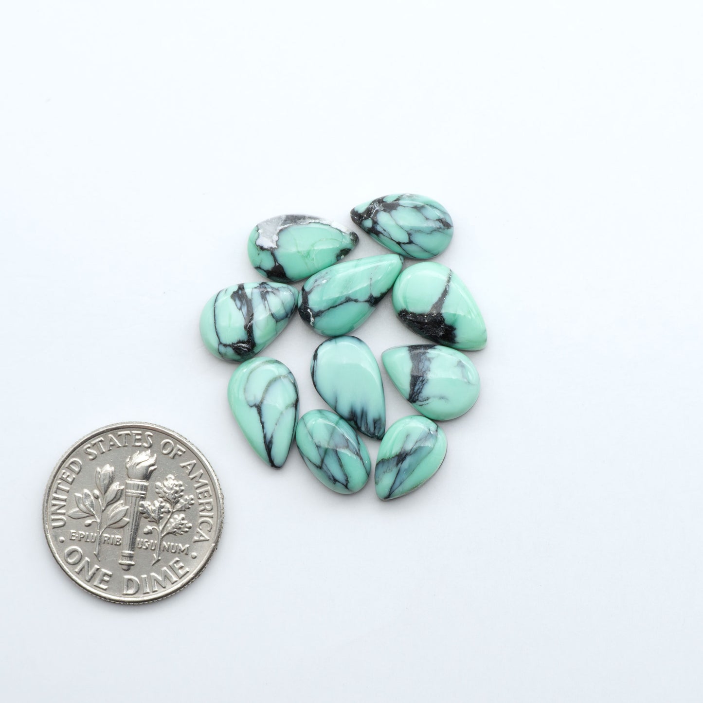 Shop Variscite cabochons with natural matrix patterns, ideal for silversmiths and jewelry makers creating custom rings and pendants.