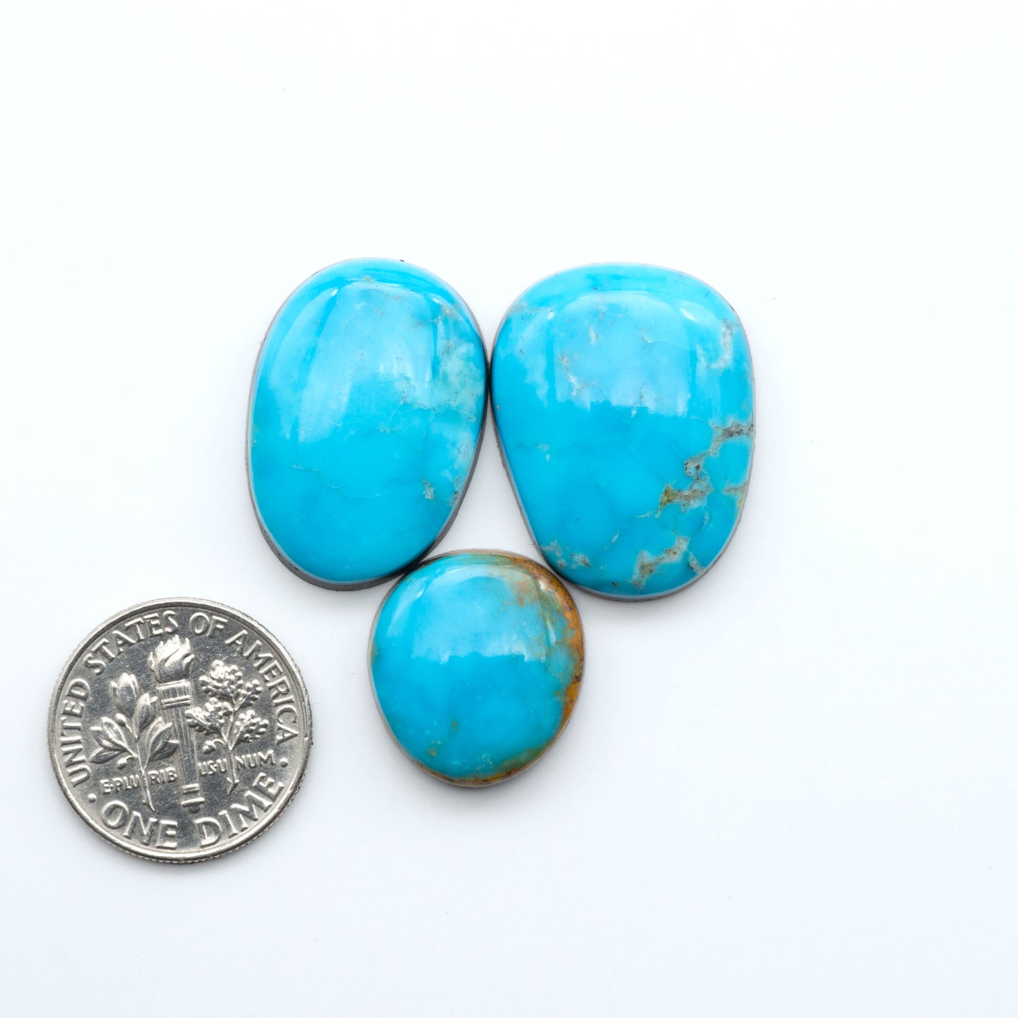 Shop authentic Blue Gem Turquoise cabochons—rare Nevada stones with vibrant blues and greens, perfect for artisan jewelry and collectors.