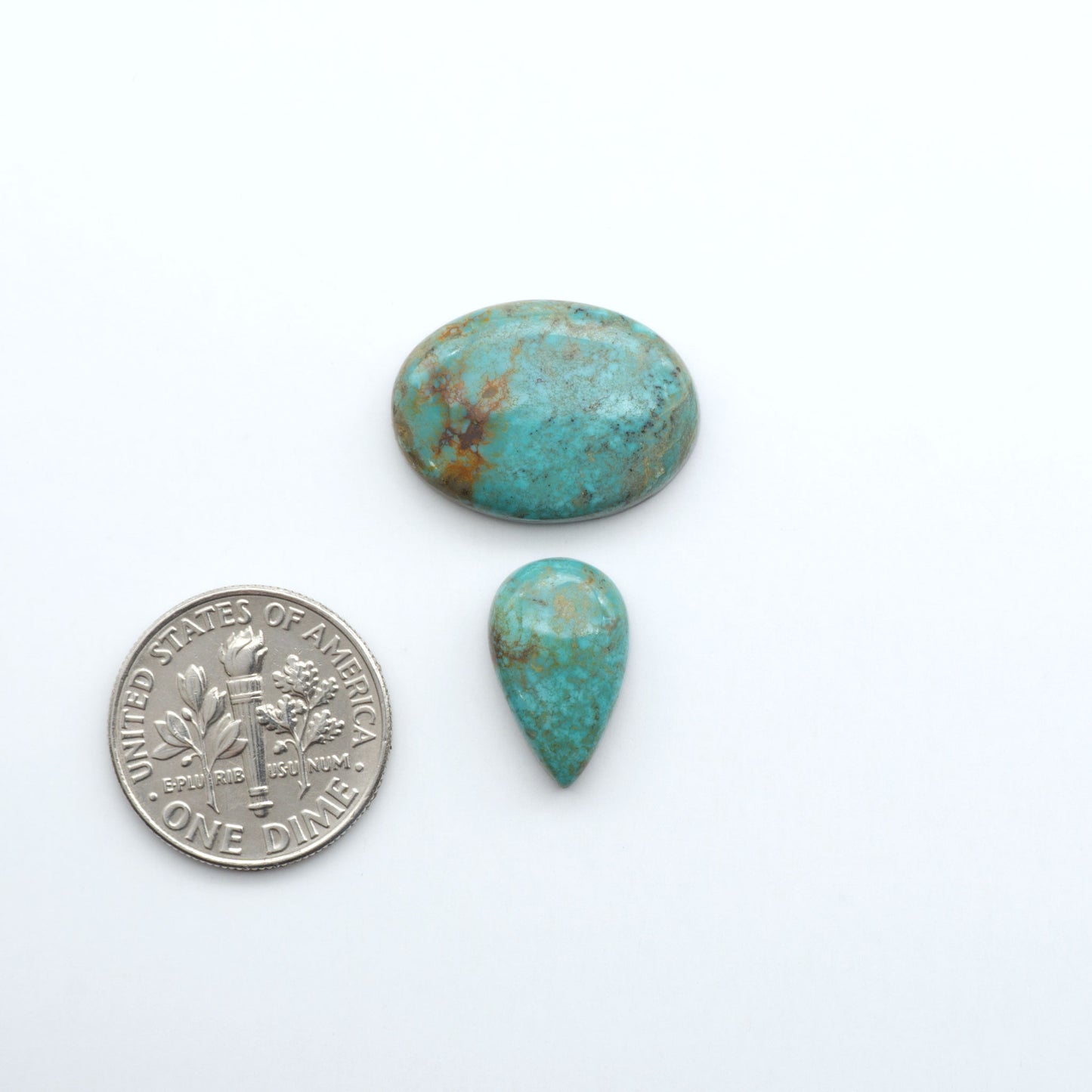 Add a touch of beauty to your collection with our stunning Pilot Mountain Turquoise Cabochons. Perfect for jewelry making each piece is truly one-of-a-kind.