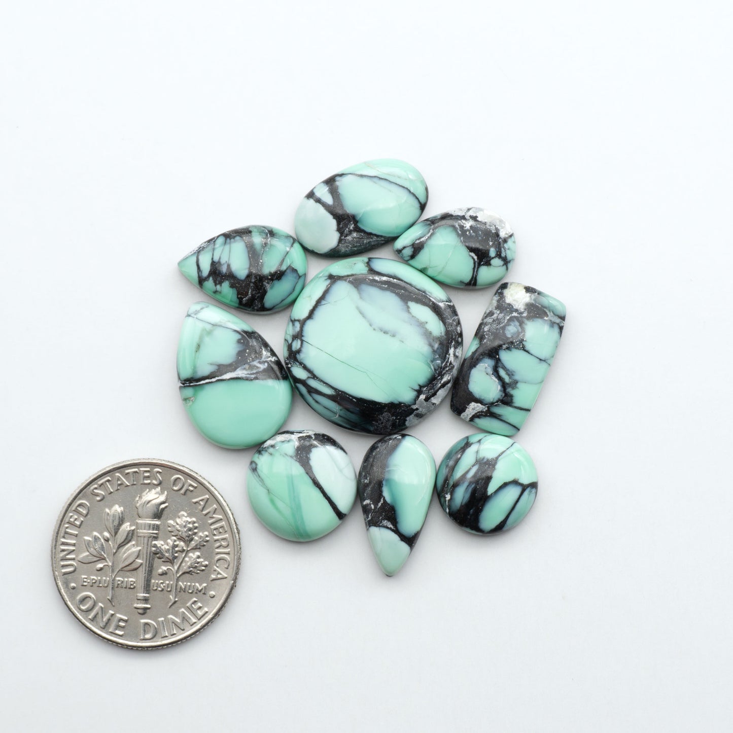 Shop Variscite cabochons with natural matrix patterns, ideal for silversmiths and jewelry makers creating custom rings and pendants.