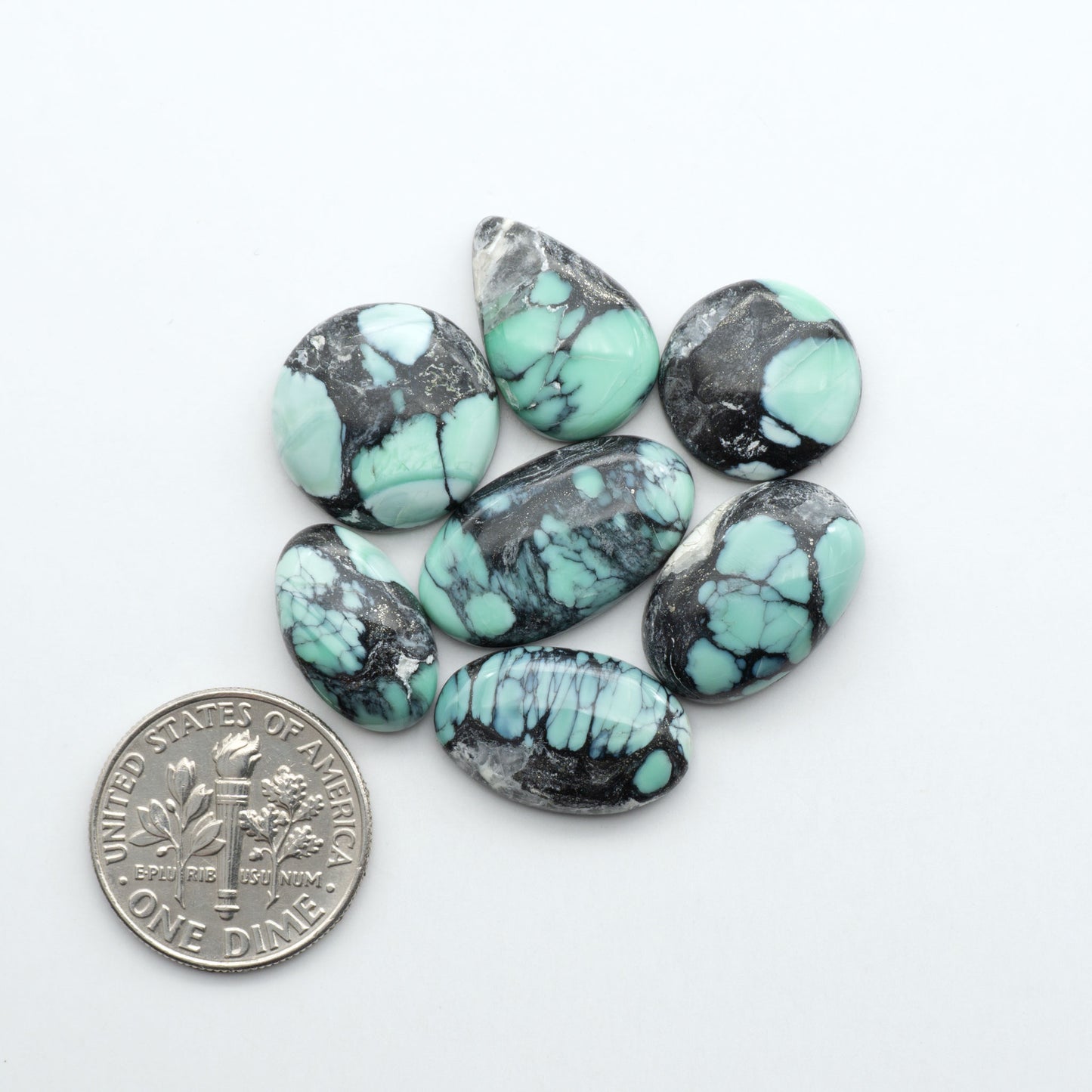 Shop Variscite cabochons with natural matrix patterns, ideal for silversmiths and jewelry makers creating custom rings and pendants.