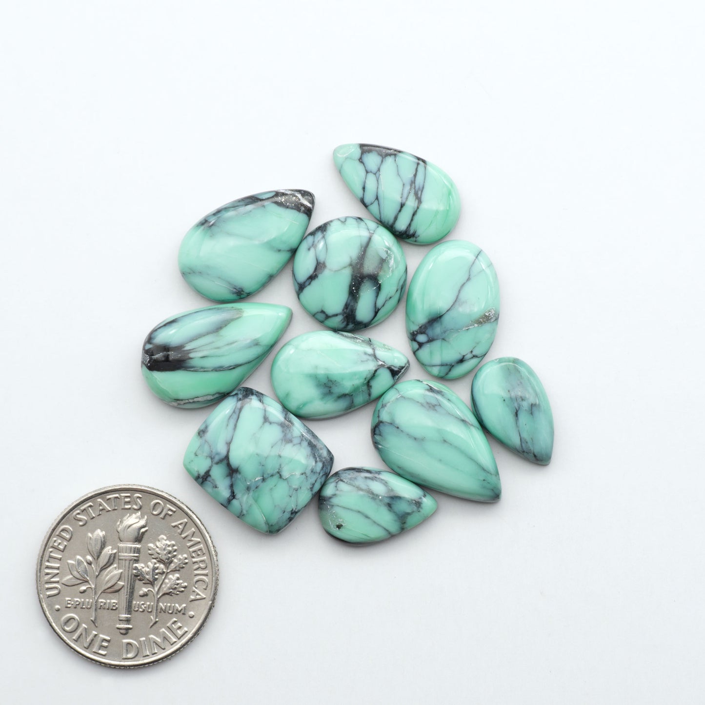 Shop Variscite cabochons with natural matrix patterns, ideal for silversmiths and jewelry makers creating custom rings and pendants.