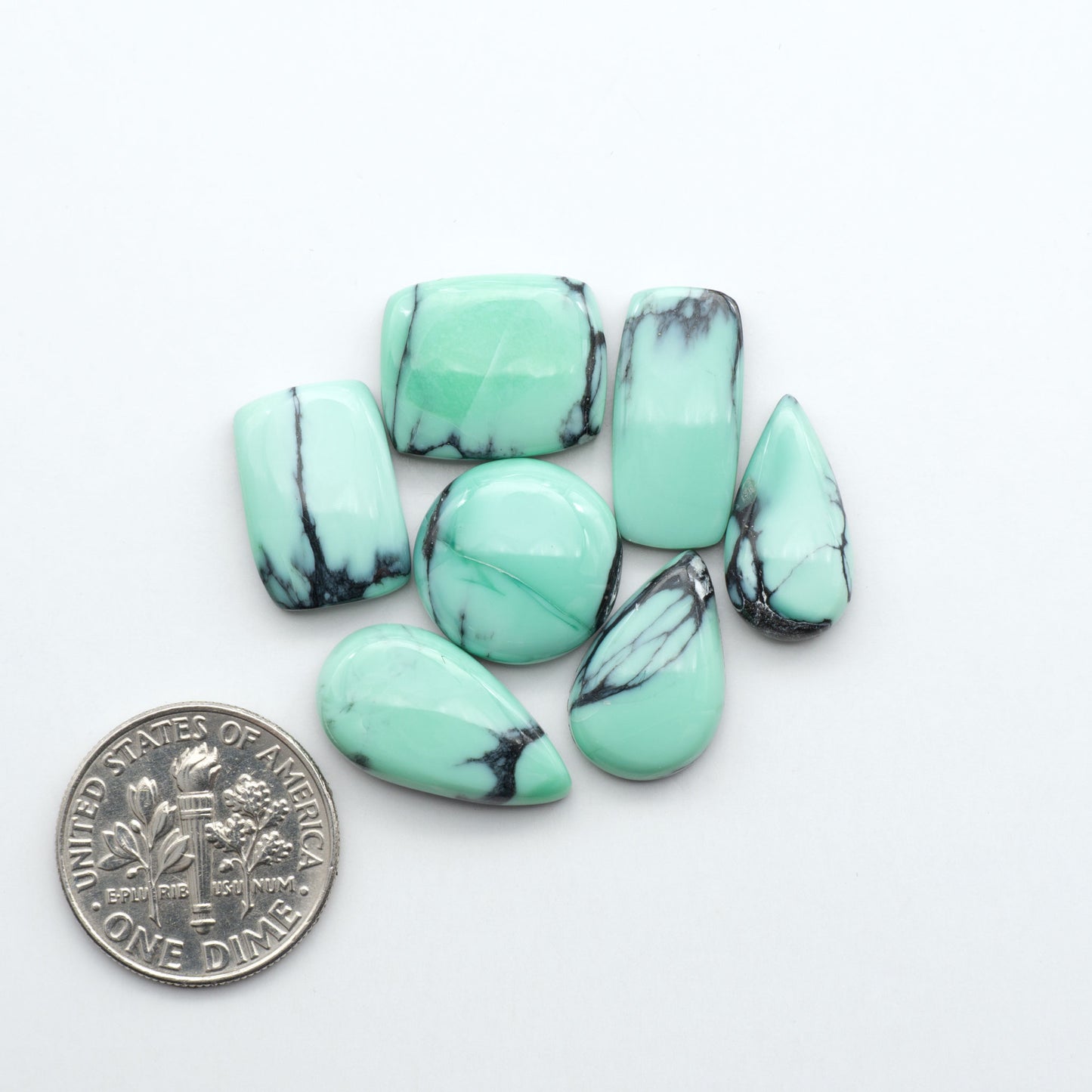 Shop Variscite cabochons with natural matrix patterns, ideal for silversmiths and jewelry makers creating custom rings and pendants.