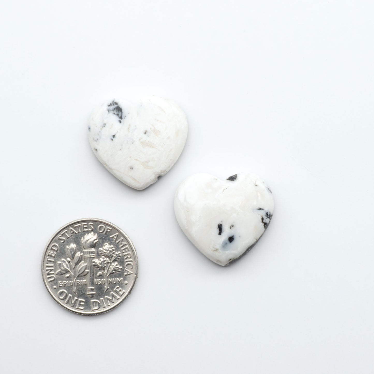 Natural White Buffalo Stone Cabochons are semi-precious gemstones cut into shapes ideal for jewelry-making, making them an excellent choice for artisans