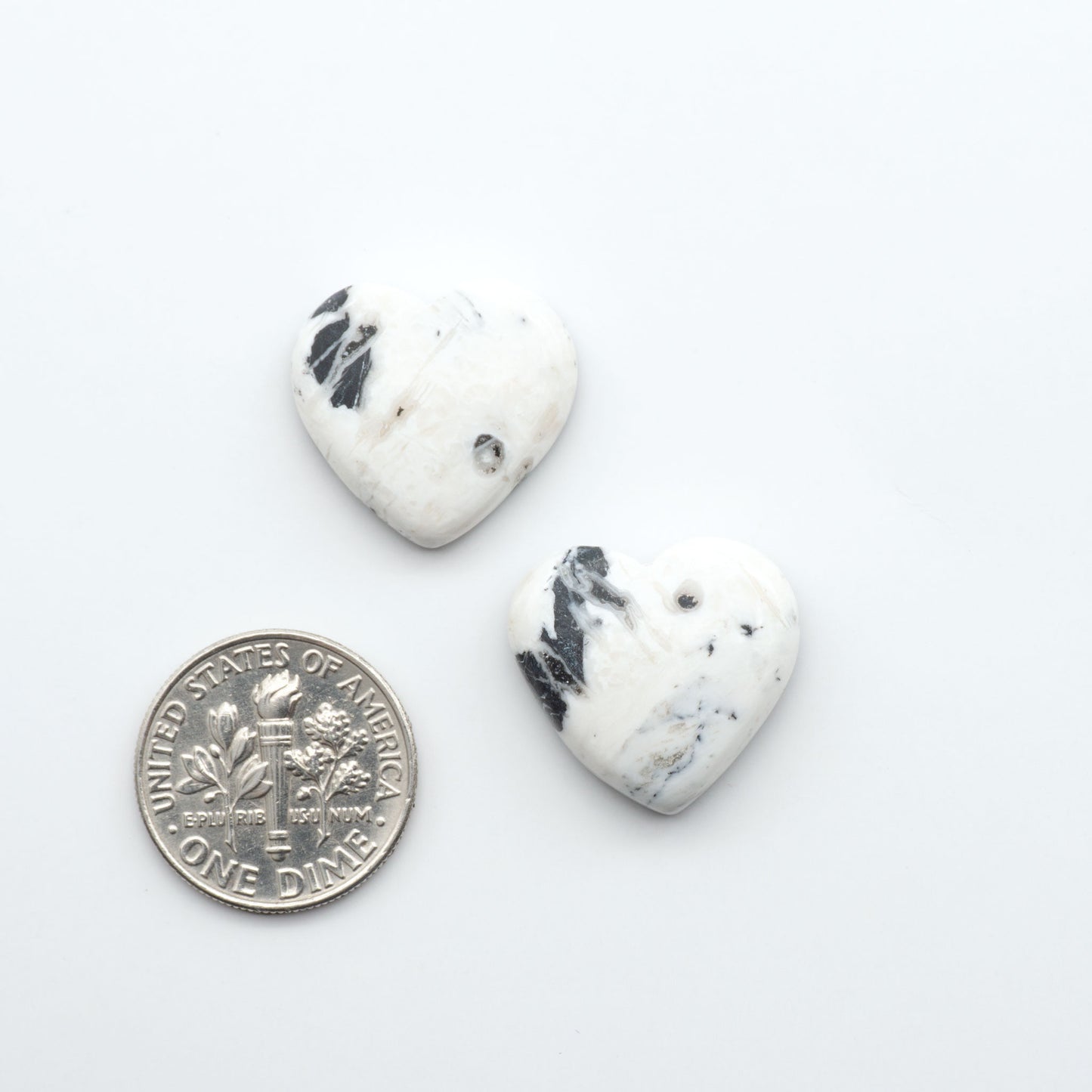 Natural White Buffalo Stone Cabochons are semi-precious gemstones cut into shapes ideal for jewelry-making, making them an excellent choice for artisans