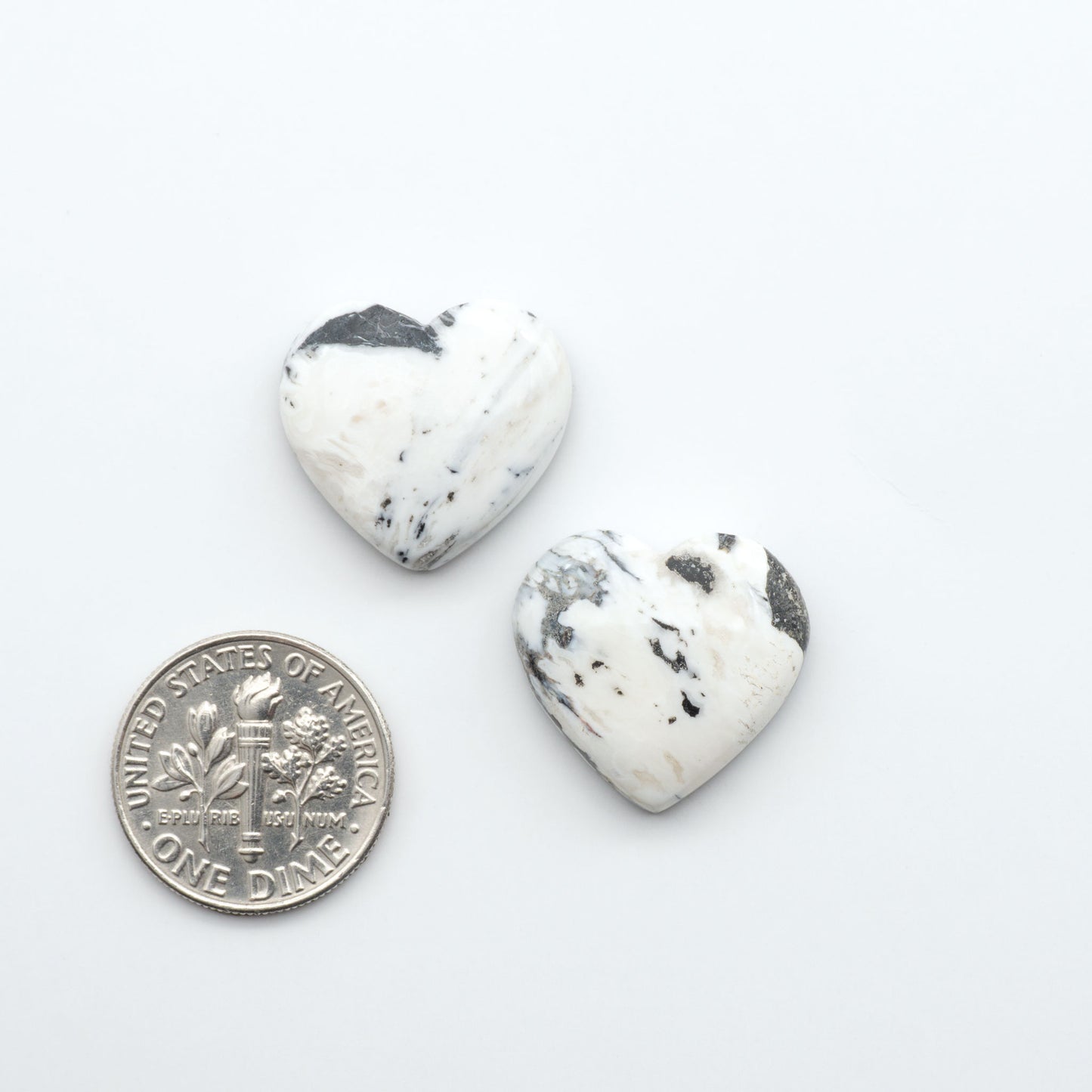 Natural White Buffalo Stone Cabochons are semi-precious gemstones cut into shapes ideal for jewelry-making, making them an excellent choice for artisans