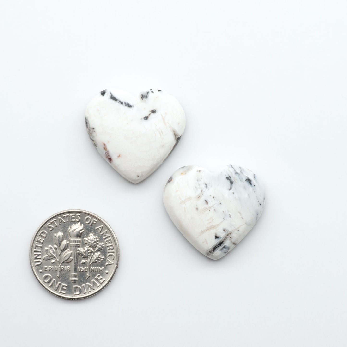 Natural White Buffalo Stone Cabochons are semi-precious gemstones cut into shapes ideal for jewelry-making, making them an excellent choice for artisans