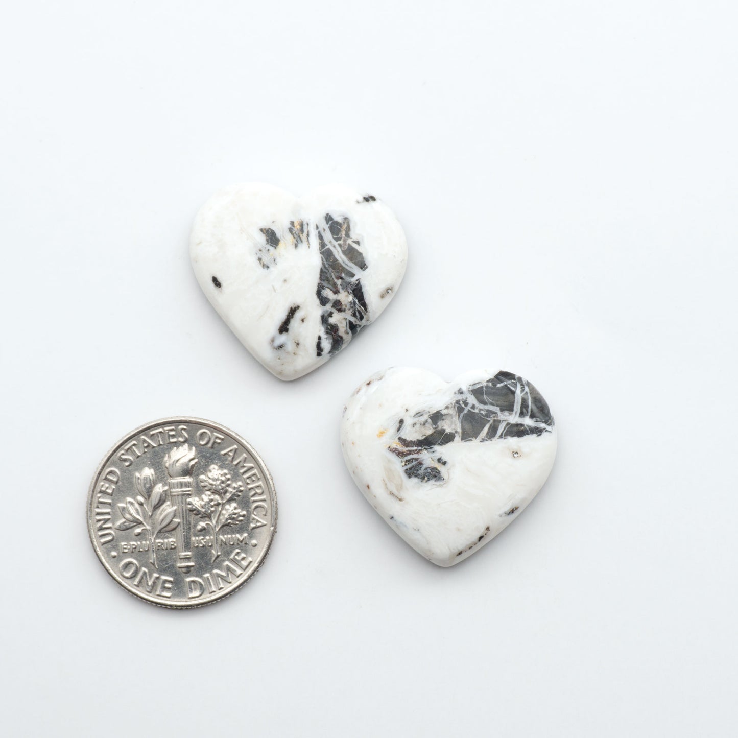 Natural White Buffalo Stone Cabochons are semi-precious gemstones cut into shapes ideal for jewelry-making, making them an excellent choice for artisans