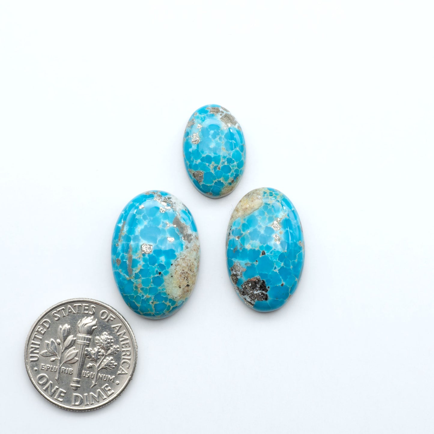 Sierra Bella Turquoise cabochons feature rich blue-green color and natural matrix variation. Ideal for silversmiths, jewelers, and custom jewelry designs.