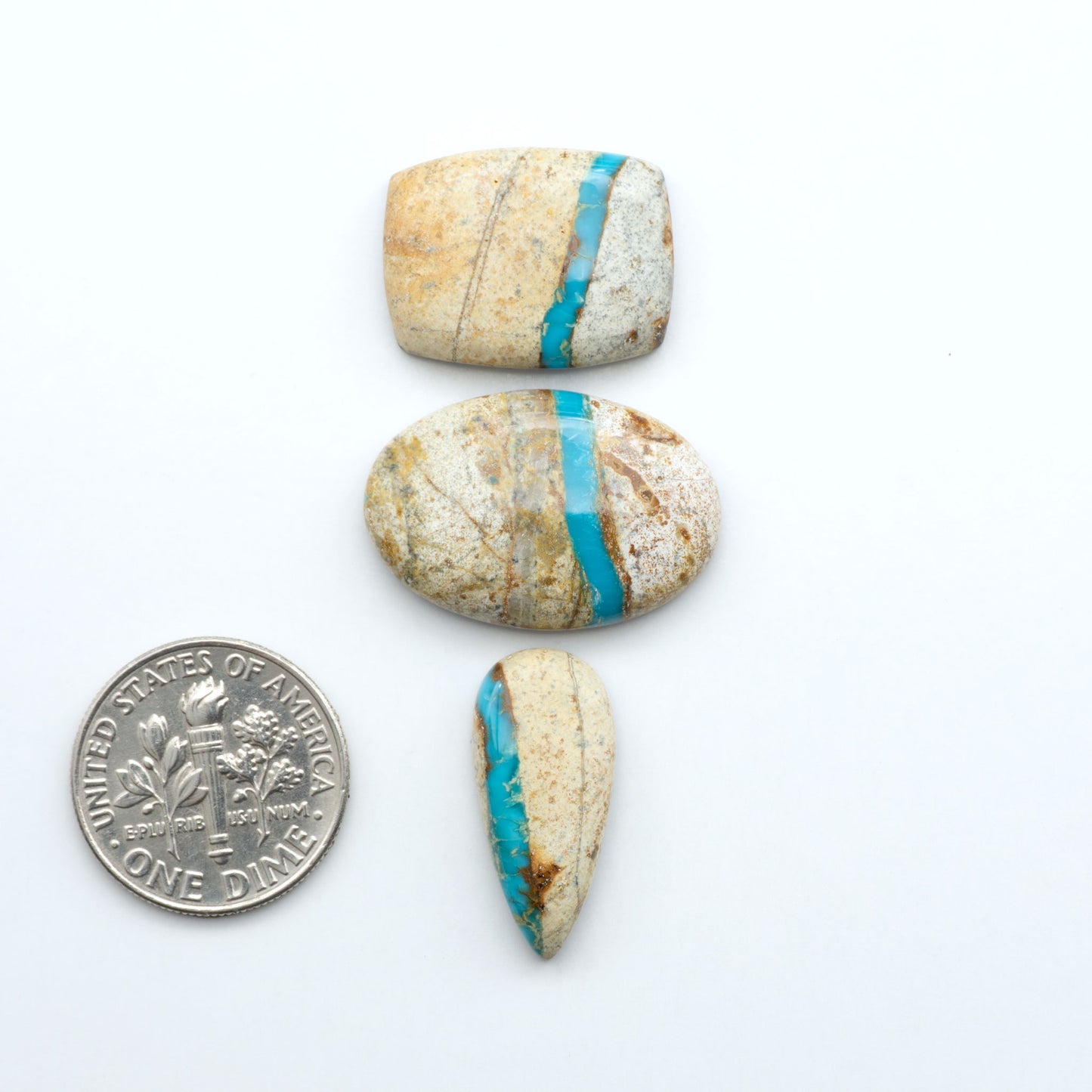 Royston Turquoise cabochons are famous for their distinctive matrix and unique green and blue hues, making them a favored option among jewelry designers.