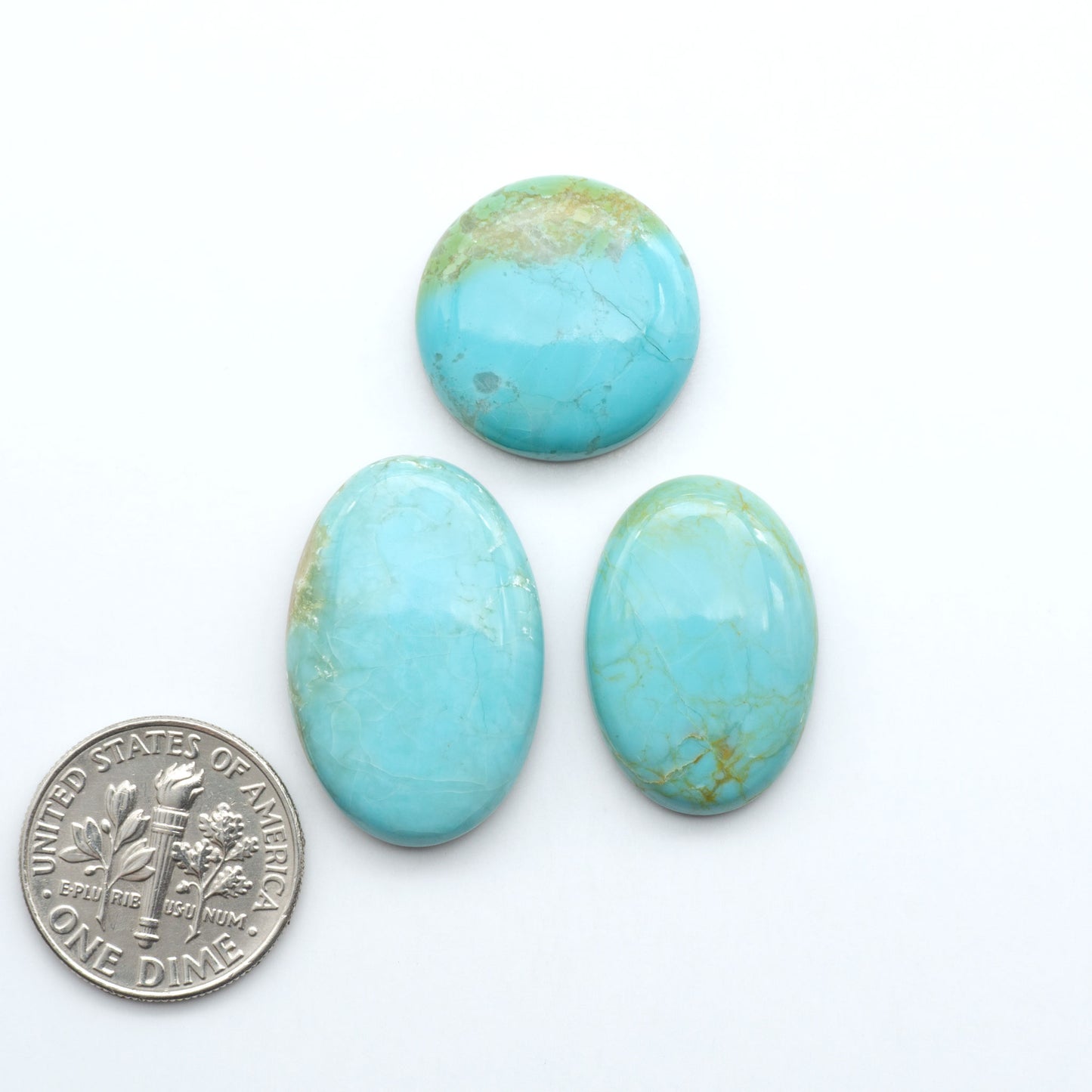 Add a touch of beauty to your collection with our stunning Pilot Mountain Turquoise Cabochons. Perfect for jewelry making each piece is truly one-of-a-kind.
