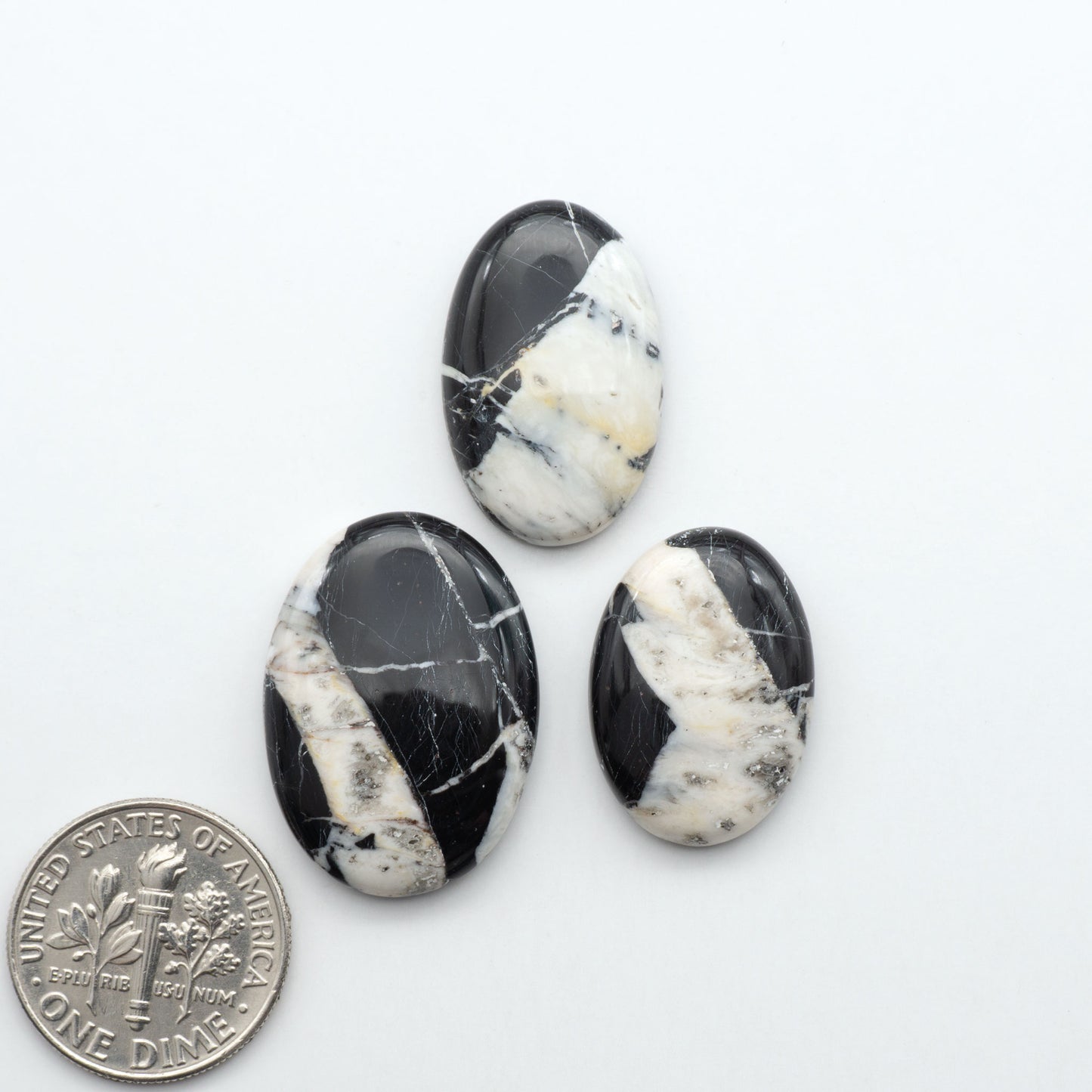 Natural White Buffalo Stone Cabochons are semi-precious gemstones cut into shapes ideal for jewelry-making, making them an excellent choice for artisans.
