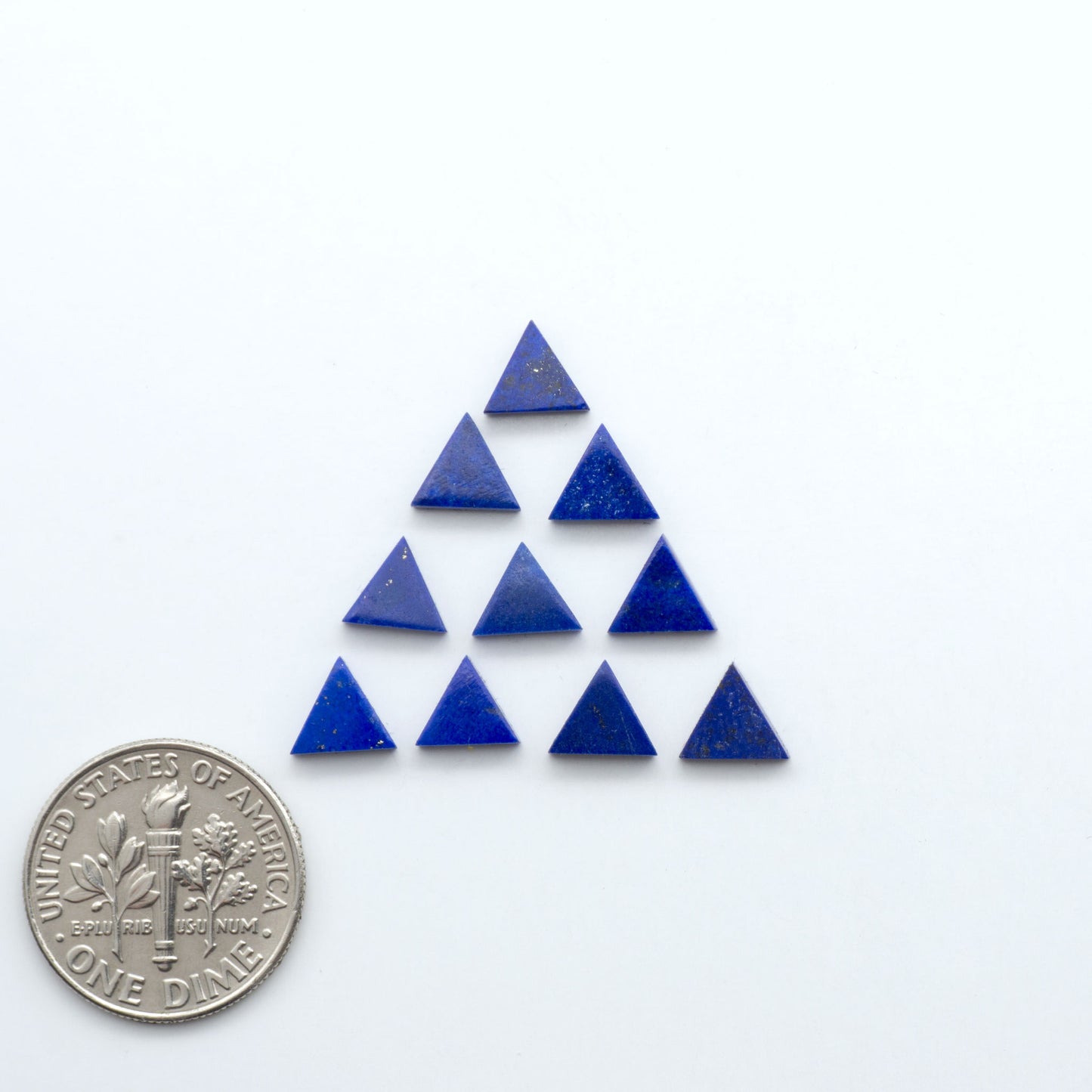 Shop natural Lapis Lazuli cabochons with rich blue tones and golden pyrite, perfect for silversmiths and jewelry makers designing custom pieces.