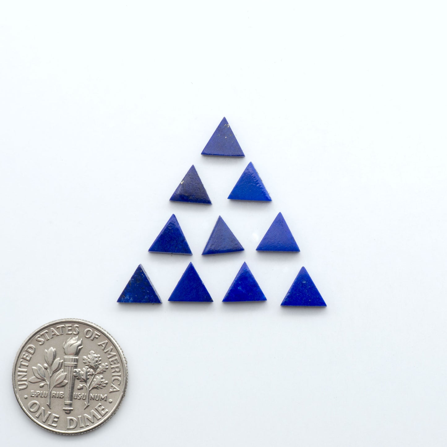 Shop natural Lapis Lazuli cabochons with rich blue tones and golden pyrite, perfect for silversmiths and jewelry makers designing custom pieces.