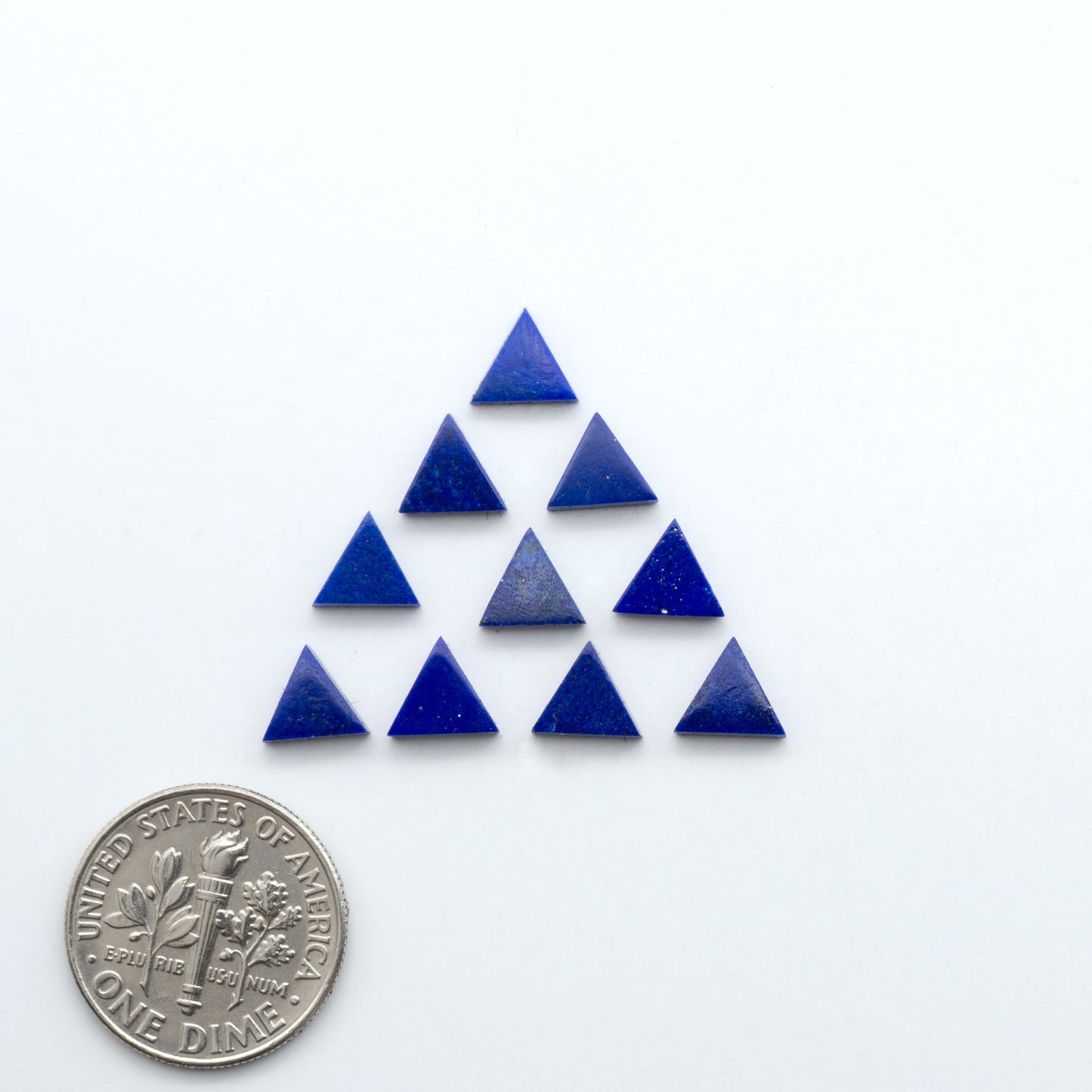 Shop natural Lapis Lazuli cabochons with rich blue tones and golden pyrite, perfect for silversmiths and jewelry makers designing custom pieces.