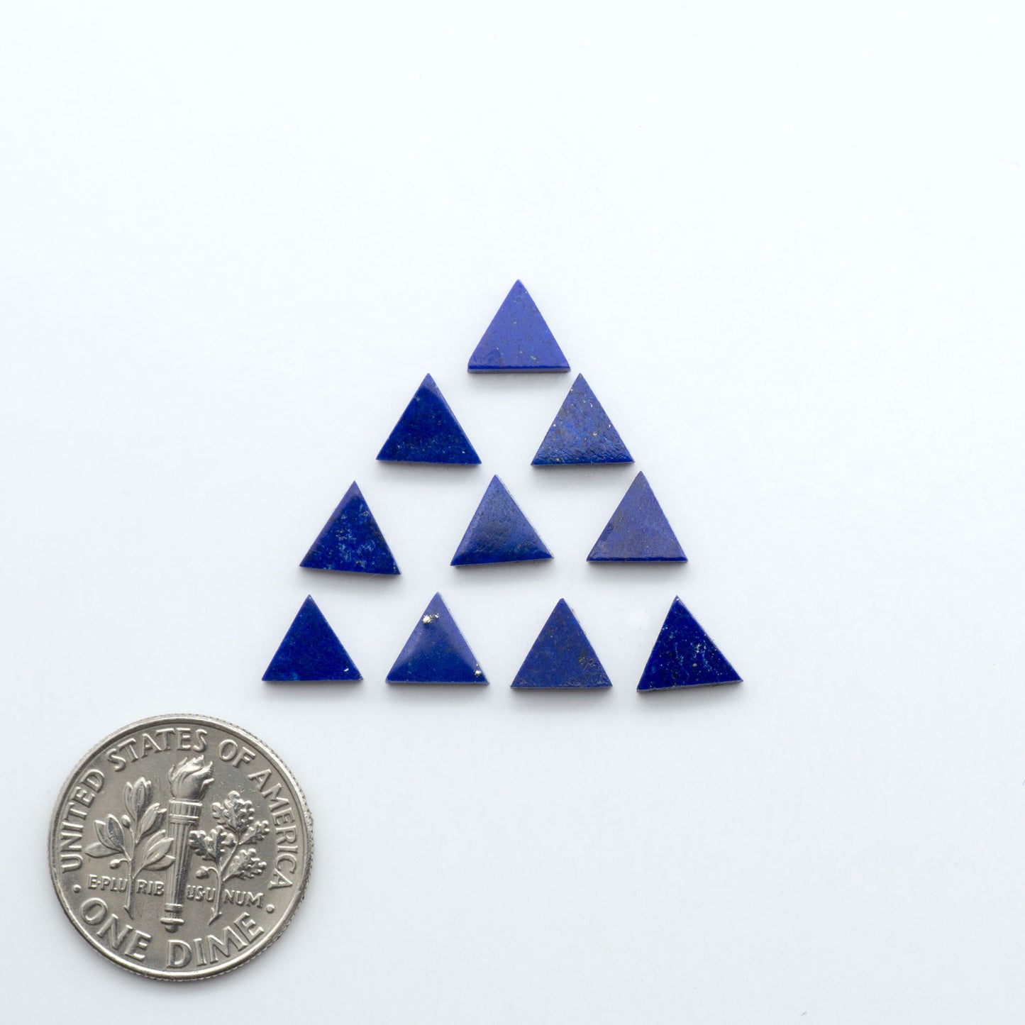 Shop natural Lapis Lazuli cabochons with rich blue tones and golden pyrite, perfect for silversmiths and jewelry makers designing custom pieces.