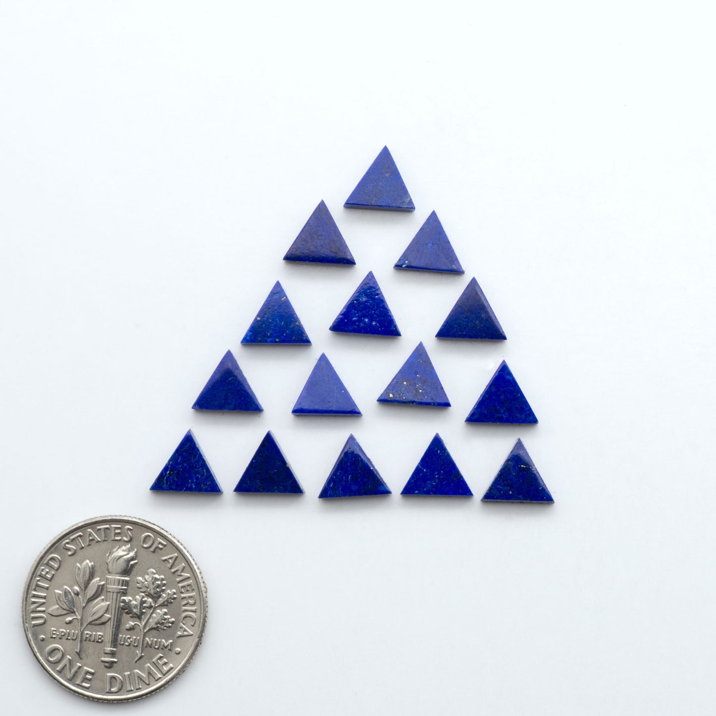 Shop natural Lapis Lazuli cabochons with rich blue tones and golden pyrite, perfect for silversmiths and jewelry makers designing custom pieces.