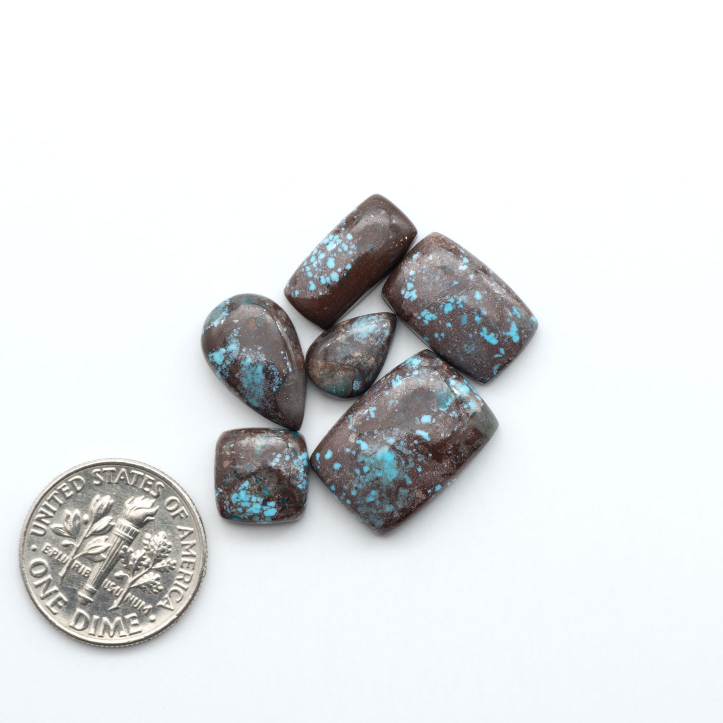 Rare Bisbee Turquoise cabochons with rich blue color and classic brown matrix. Perfect for jewelry makers, collectors, and lovers of fine American turquoise.