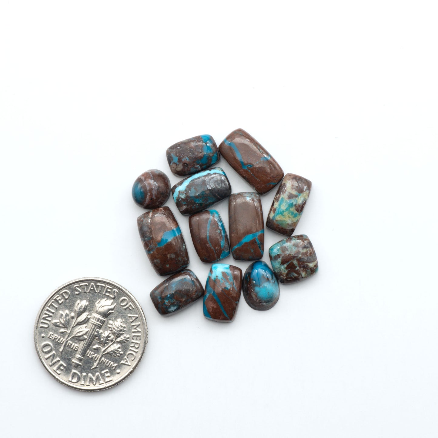 Rare Bisbee Turquoise cabochons with rich blue color and classic brown matrix. Perfect for jewelry makers, collectors, and lovers of fine American turquoise.