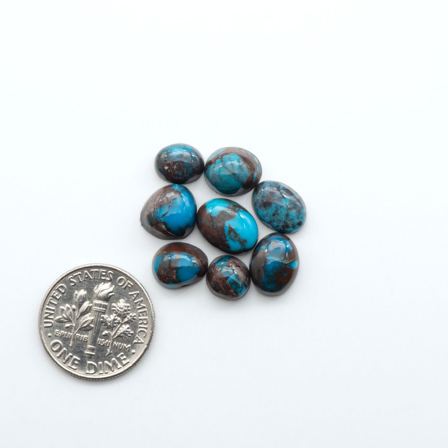 Rare Bisbee Turquoise cabochons with rich blue color and classic brown matrix. Perfect for jewelry makers, collectors, and lovers of fine American turquoise.