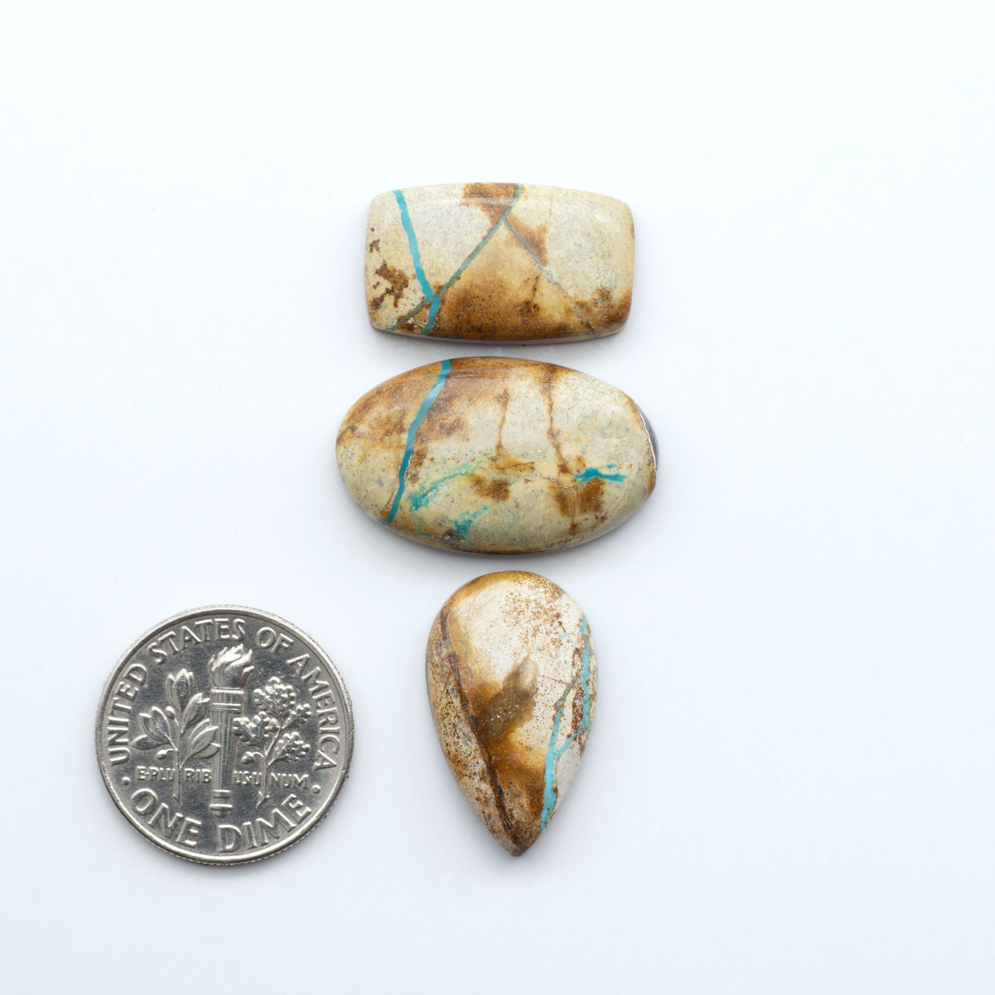 Royston Turquoise cabochons are famous for their distinctive matrix and unique green and blue hues, making them a favored option among jewelry designers.