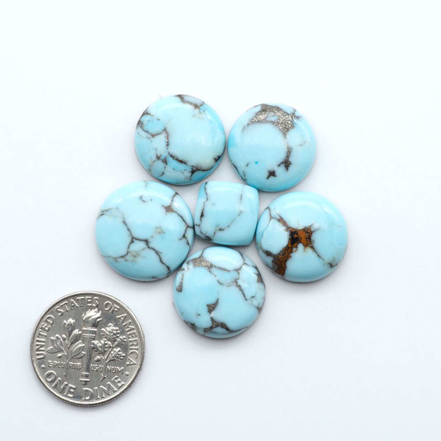 Enhance your jewelry designs with Pressed Turquoise Nugget Cabochons. Crafted from composite materials they add a captivating touch to your creations.