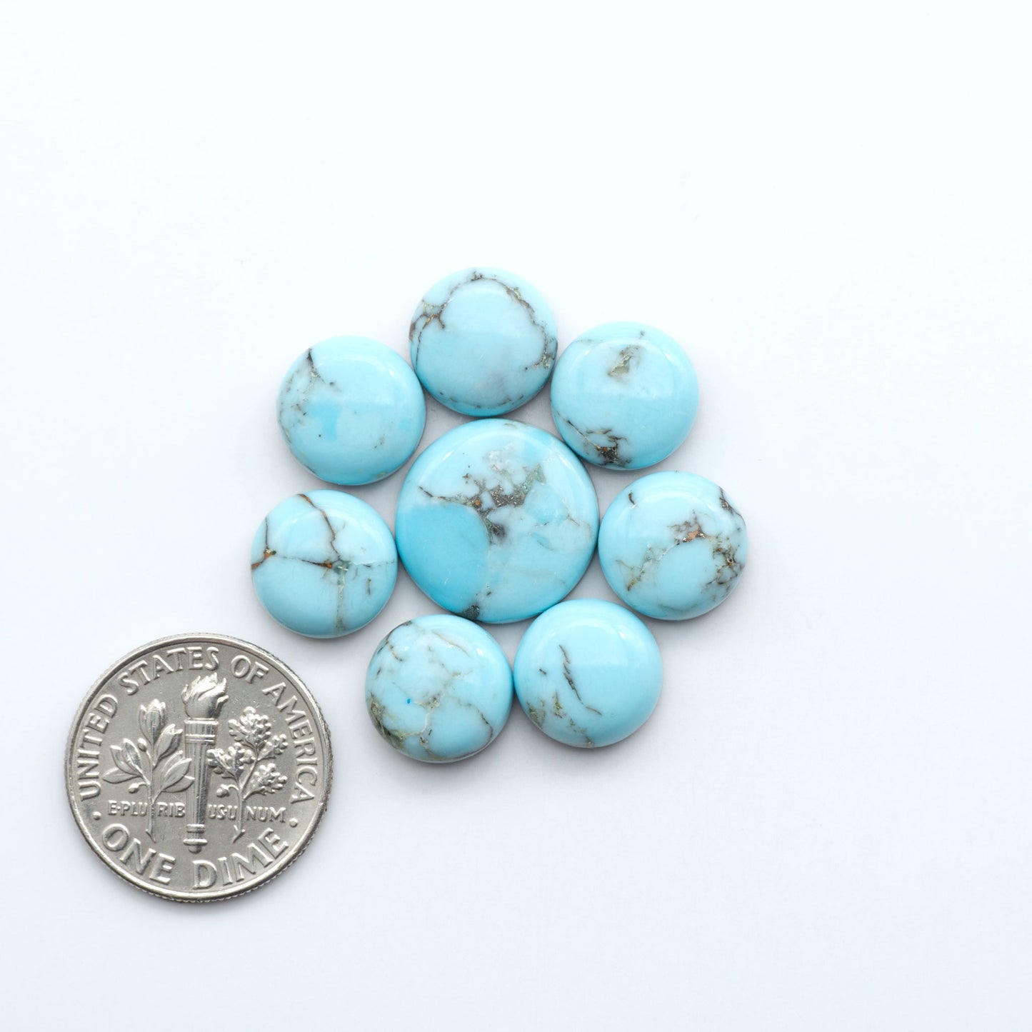 Enhance your jewelry designs with Pressed Turquoise Nugget Cabochons. Crafted from composite materials they add a captivating touch to your creations.