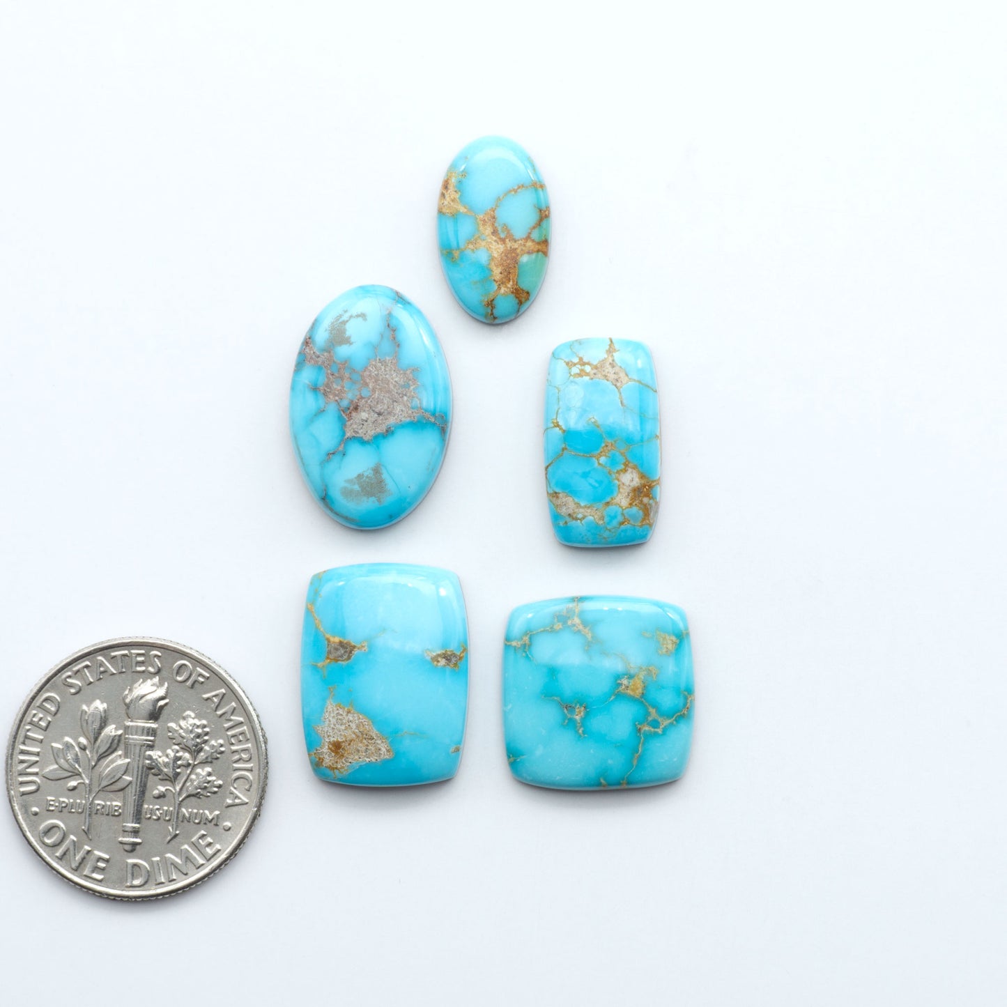 Sierra Bella Turquoise cabochons feature rich blue-green color and natural matrix variation. Ideal for silversmiths, jewelers, and custom jewelry designs.